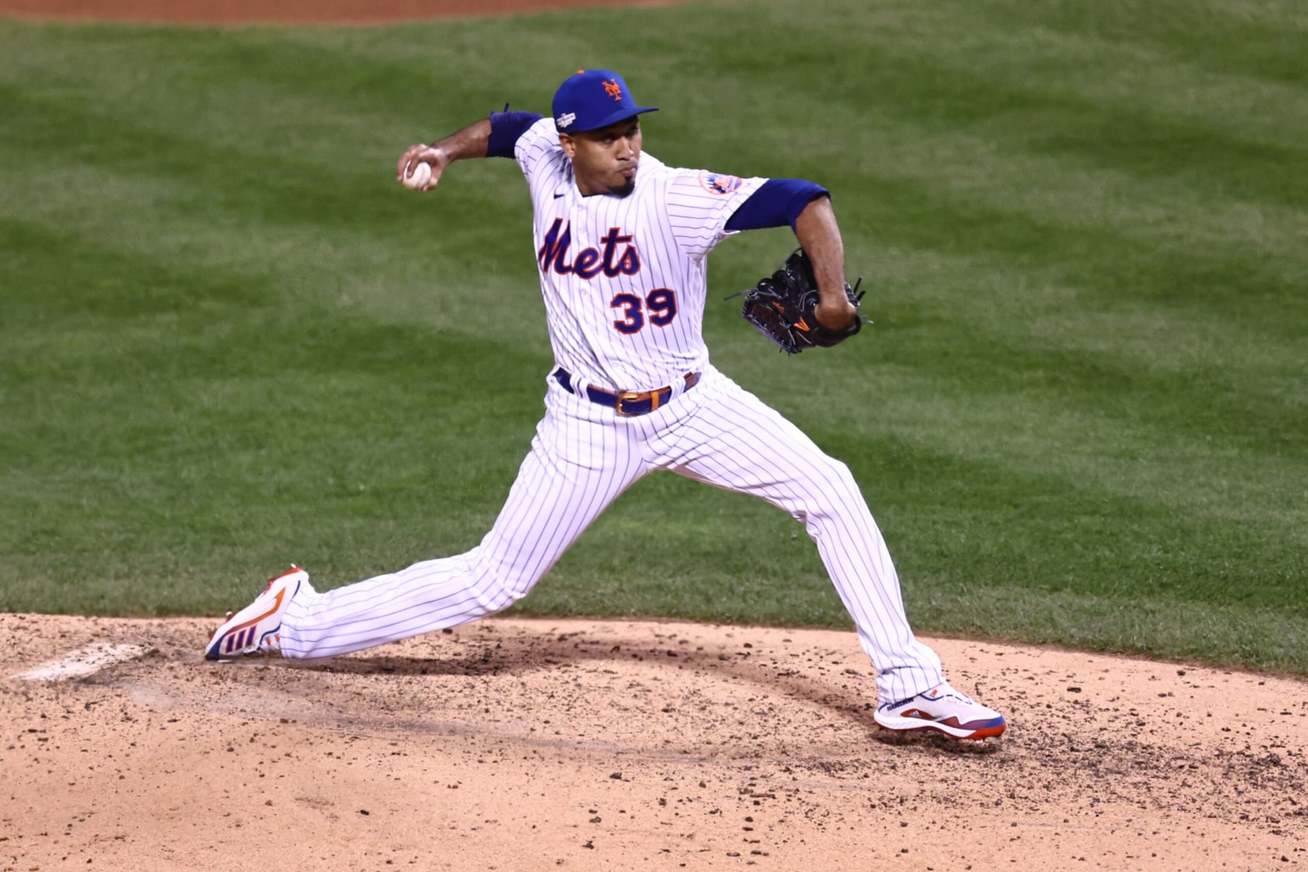 NEW YORK, NEW YORK - OCTOBER 08: Edwin Diaz #39 of the New York Mets delivers during the seventh inning against the San Diego Padres in game two of the Wild Card Series at Citi Field on October 08, 2022 in New York City. (Photo by Dustin Satloff/Getty Images) NEW YORK, NEW YORK - OCTOBER 08: Edwin Diaz #39 of the New York Mets delivers during the seventh inning against the San Diego Padres in game two of the Wild Card Series at Citi Field on October 08, 2022 in New York City. (Photo by Dustin Satloff/Getty Images)