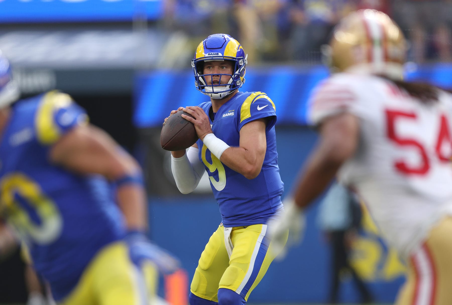 INGLEWOOD, CALIFORNIA - OCTOBER 30: Matthew Stafford #9 of the Los Angeles Rams looks to pass during a 31-14 loss to the San Francisco 49ers at SoFi Stadium on October 30, 2022 in Inglewood, California. (Photo by Harry How/Getty Images)