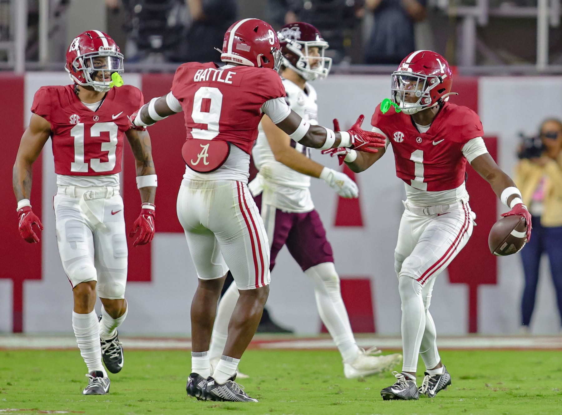 Kool-Aid McKinstry (right), Jordan Battle and Malachi Moore