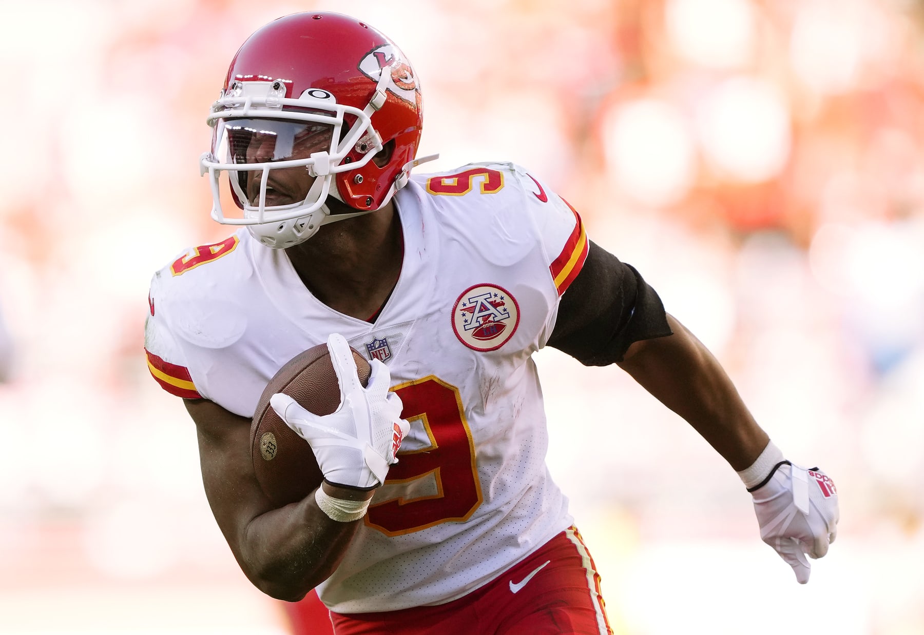 SANTA CLARA, CALIFORNIA - OCTOBER 23: JuJu Smith-Schuster #9 of the Kansas City Chiefs carries the ball for a touchdown in the fourth quarter against the San Francisco 49ers at Levi's Stadium on October 23, 2022 in Santa Clara, California. (Photo by Thearon W. Henderson/Getty Images)