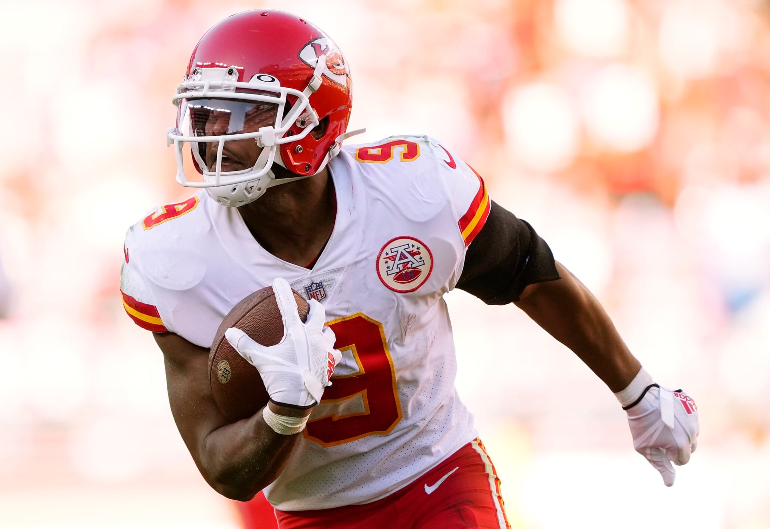 SANTA CLARA, CALIFORNIA - OCTOBER 23: JuJu Smith-Schuster #9 of the Kansas City Chiefs carries the ball for a touchdown in the fourth quarter against the San Francisco 49ers at Levi's Stadium on October 23, 2022 in Santa Clara, California. (Photo by Thearon W. Henderson/Getty Images)