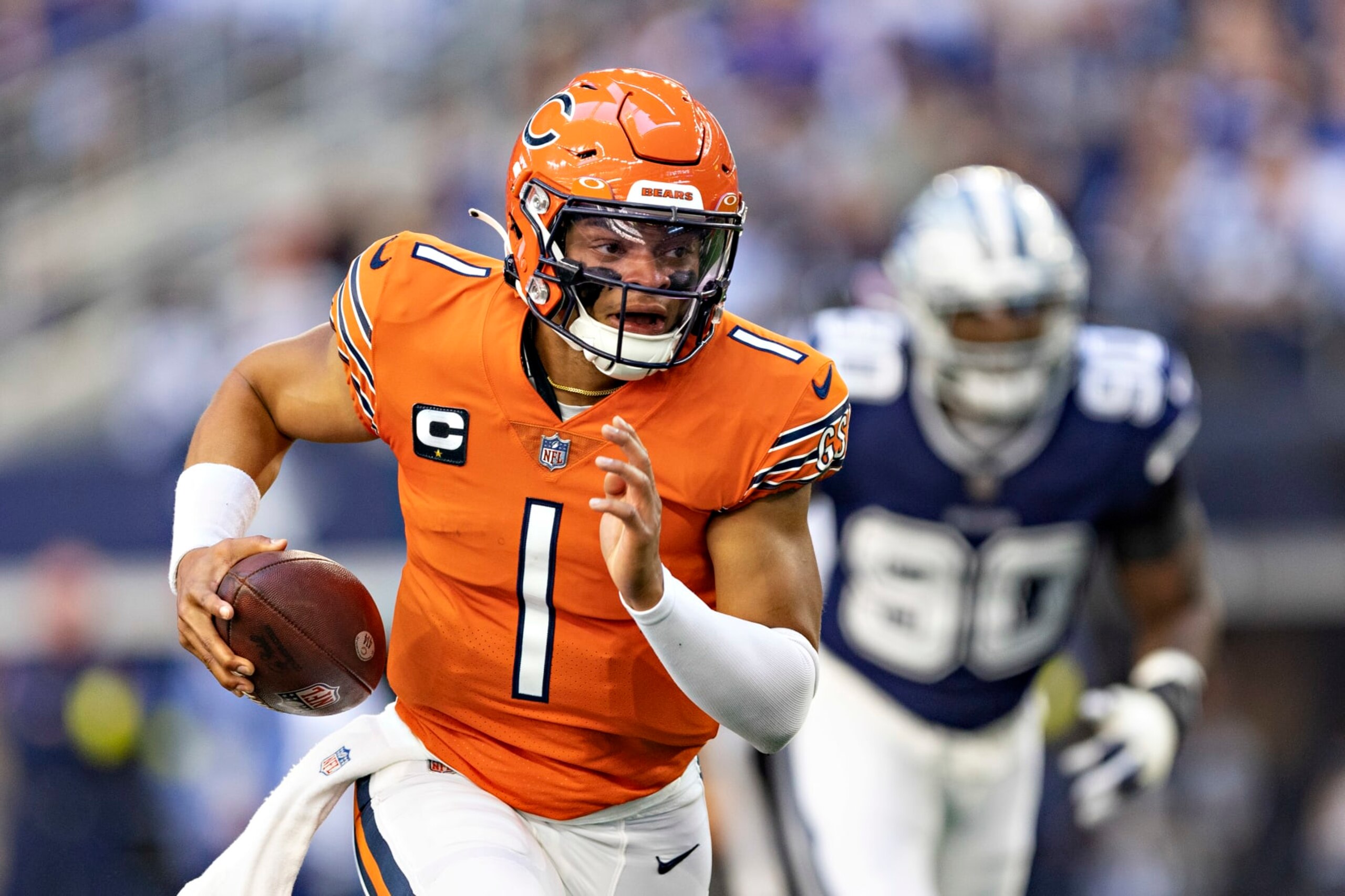 ARLINGTON, TEXAS - OCTOBER 30: Justin Fields #1 of the Chicago Bears runs the ball during a game against the Dallas Cowboys at AT&T Stadium on October 30, 2022 in Arlington, Texas. The Cowboys defeated the Bears 49-29. (Photo by Wesley Hitt/Getty Images) ARLINGTON, TEXAS - OCTOBER 30: Justin Fields #1 of the Chicago Bears runs the ball during a game against the Dallas Cowboys at AT&T Stadium on October 30, 2022 in Arlington, Texas. The Cowboys defeated the Bears 49-29. (Photo by Wesley Hitt/Getty Images)