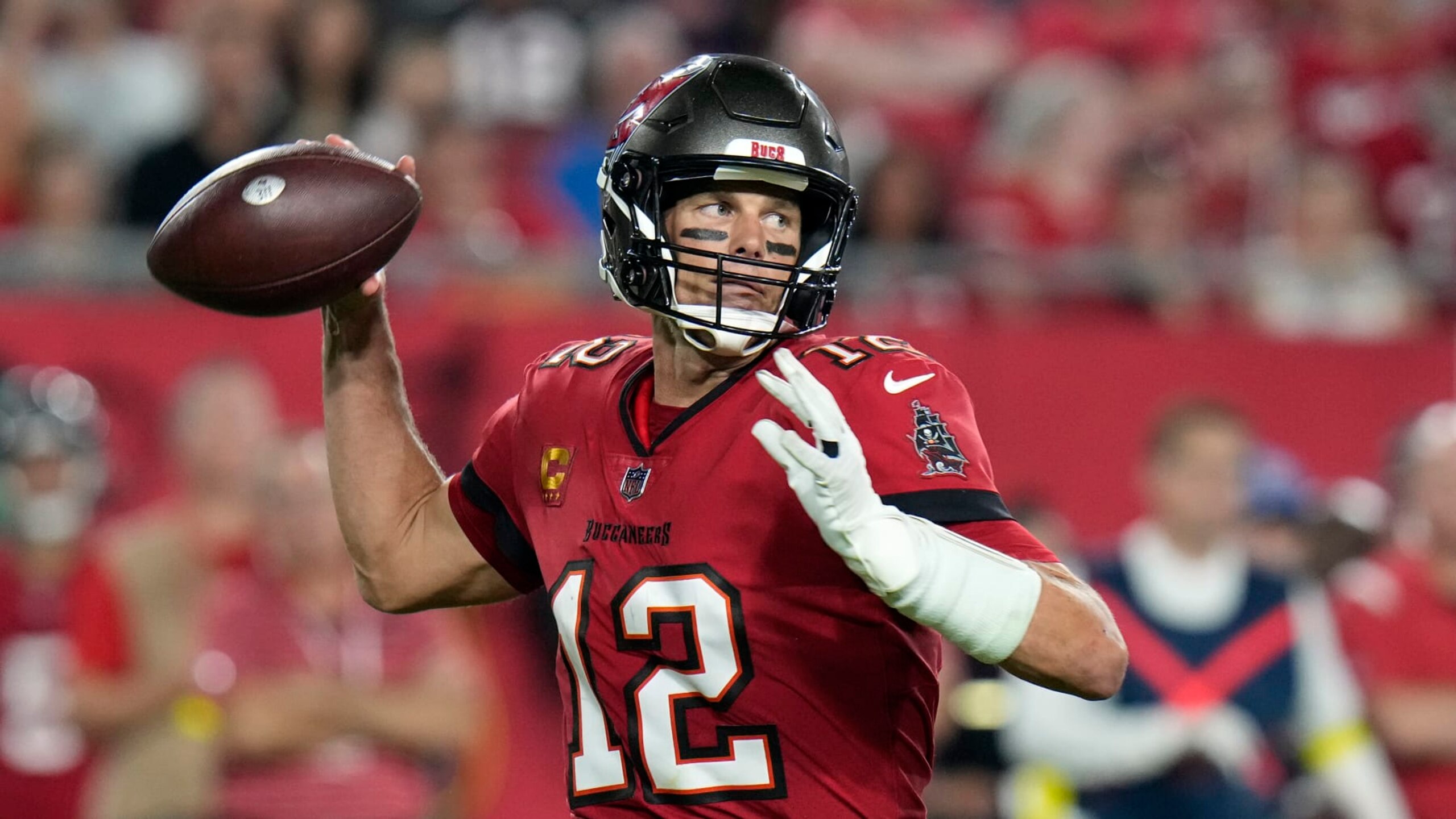 Tampa Bay Buccaneers quarterback Tom Brady passes the ball during an NFL football game against the Baltimore Ravens Thursday, Oct. 27, 2022, in Tampa, Fla. (AP Photo/Chris O'Meara) Tampa Bay Buccaneers quarterback Tom Brady passes the ball during an NFL football game against the Baltimore Ravens Thursday, Oct. 27, 2022, in Tampa, Fla. (AP Photo/Chris O'Meara)
