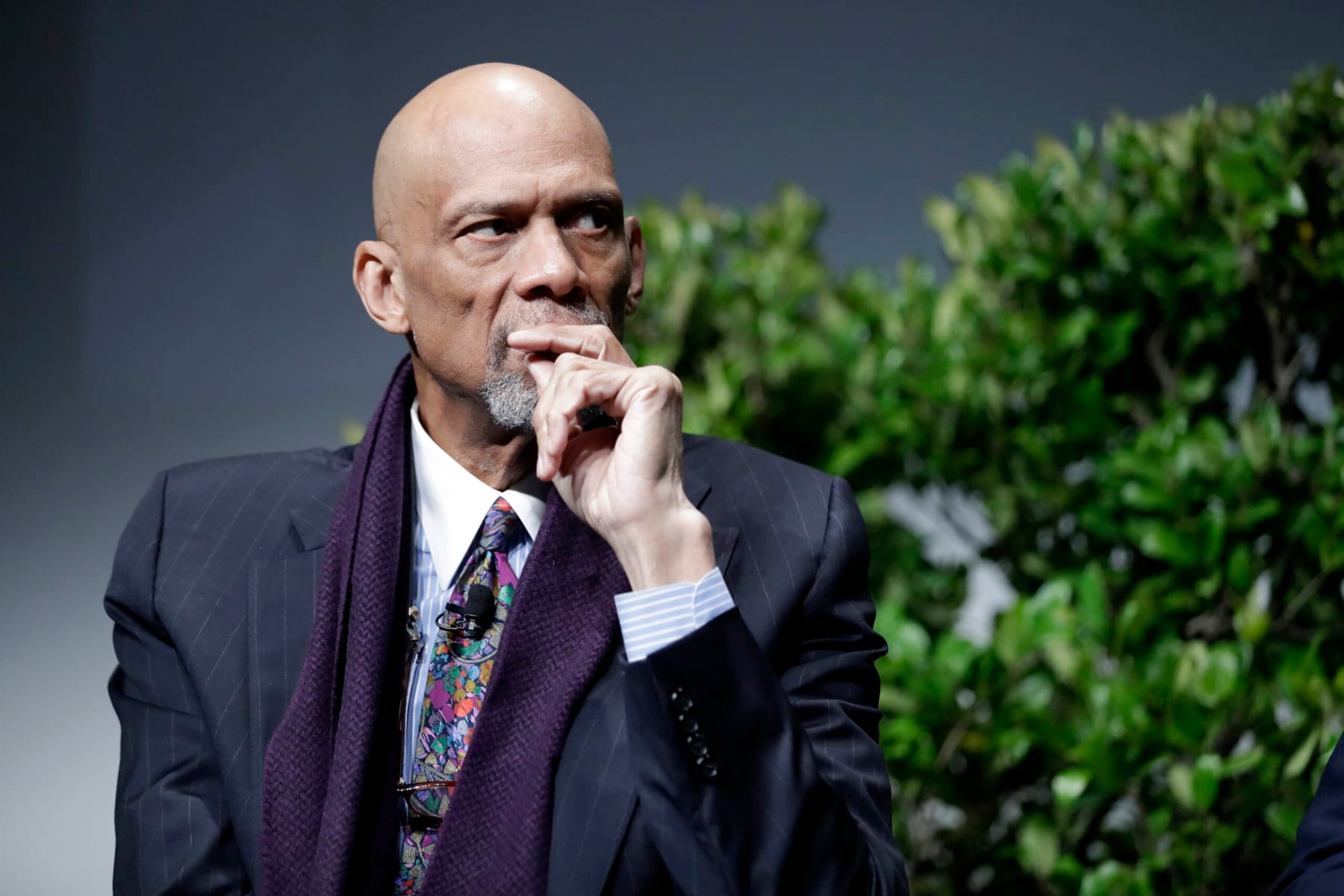 FILE - This Jan. 24, 2017, file photo, shows former NBA player Kareem Abdul-Jabbar during a sports and activism panel entitled "From Protest to Progress: Next Steps" in San Jose, Calif. Adam Abdul-Jabbar, the son of basketball legend Kareem Abdul-Jabbar, was charged Tuesday, Aug. 25, 2020, in California with stabbing a neighbor with a hunting knife during an argument over trash cans. (AP Photo/Marcio Jose Sanchez) FILE - This Jan. 24, 2017, file photo, shows former NBA player Kareem Abdul-Jabbar during a sports and activism panel entitled "From Protest to Progress: Next Steps" in San Jose, Calif. Adam Abdul-Jabbar, the son of basketball legend Kareem Abdul-Jabbar, was charged Tuesday, Aug. 25, 2020, in California with stabbing a neighbor with a hunting knife during an argument over trash cans. (AP Photo/Marcio Jose Sanchez)