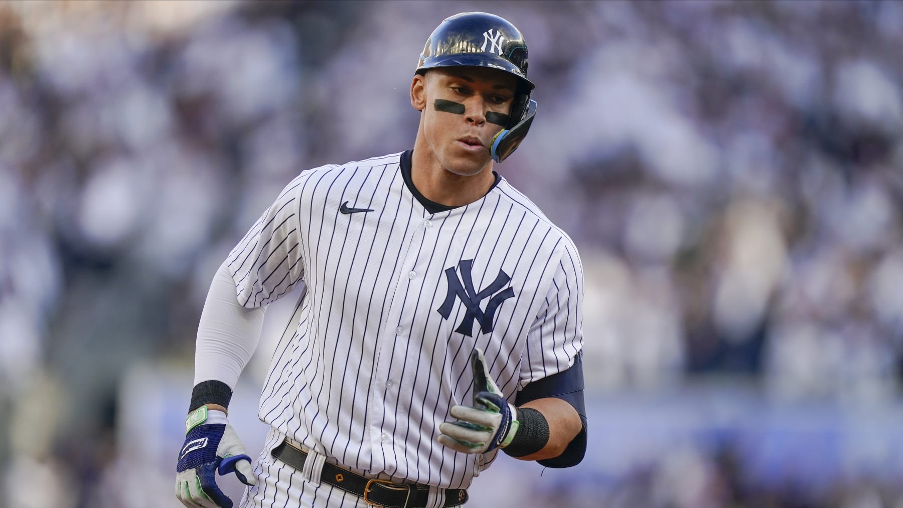 New York Yankees Aaron Judge rounds the bases after hitting a solo home run against the Cleveland Guardians during the third inning of Game 5 of an American League Division baseball series, Tuesday, Oct. 18, 2022, in New York. (AP Photo/John Minchillo)