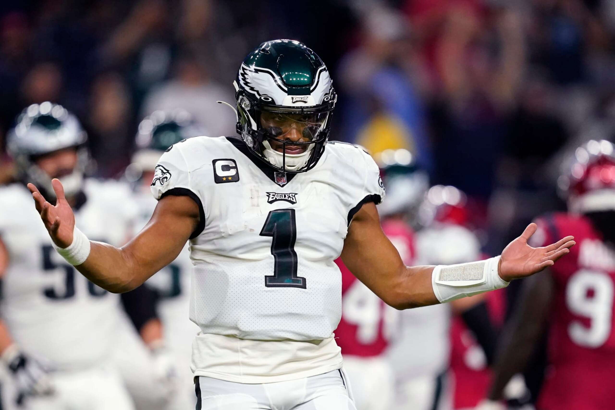 Philadelphia Eagles quarterback Jalen Hurts (1) celebrates after a touchdown by running back Miles Sanders in the first half of an NFL football game against the Houston Texans in Houston, Thursday, Nov. 3, 2022. (AP Photo/Tony Gutierrez) Philadelphia Eagles quarterback Jalen Hurts (1) celebrates after a touchdown by running back Miles Sanders in the first half of an NFL football game against the Houston Texans in Houston, Thursday, Nov. 3, 2022. (AP Photo/Tony Gutierrez)