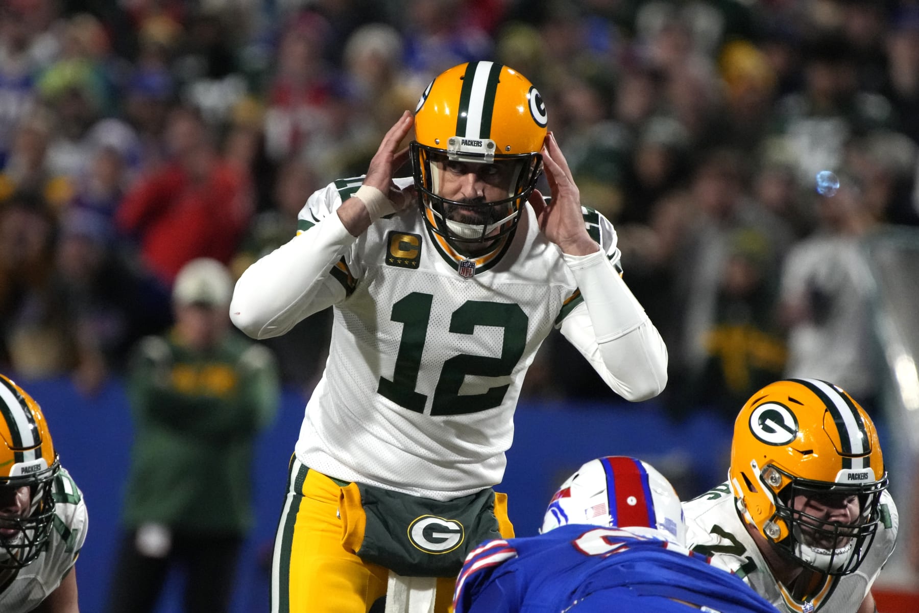Green Bay Packers quarterback Aaron Rodgers (12) calls out a play against the Buffalo Bills during the first half of an NFL football game, Sunday, Oct. 30, 2022, in Buffalo, N.Y. (AP Photo/Rick Scuteri)