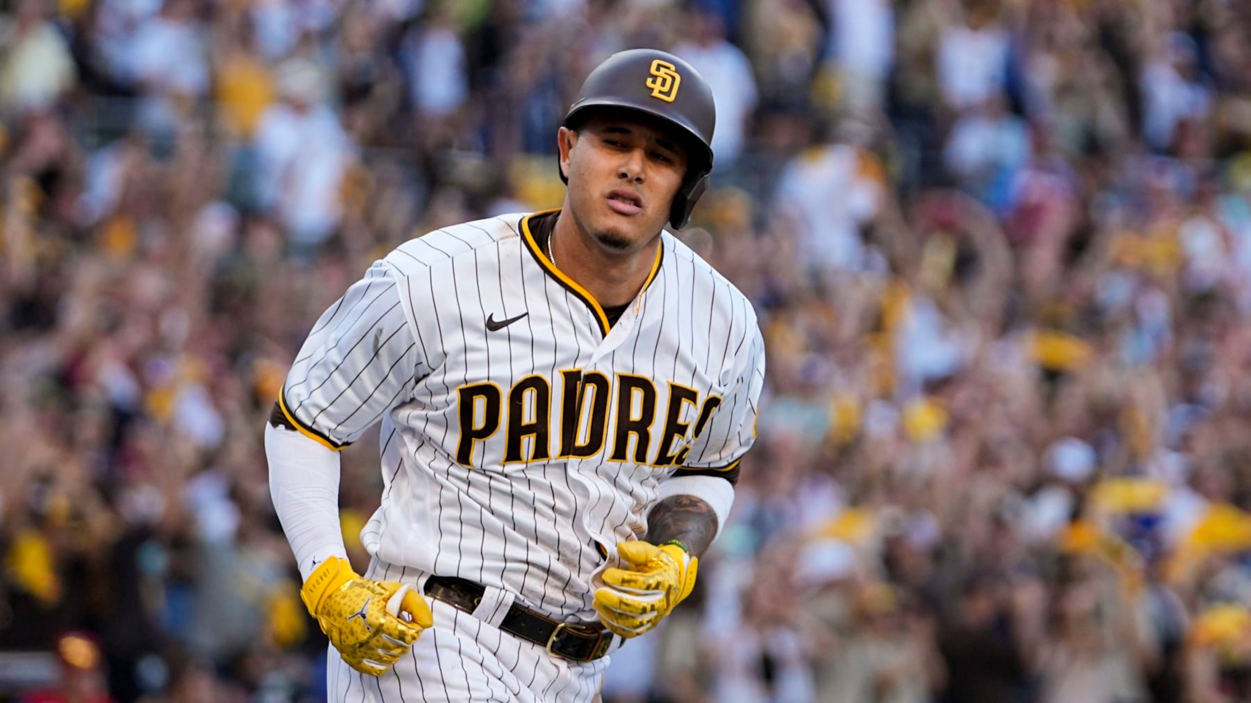San Diego Padres' Manny Machado celebrates his home run during the seventh inning in Game 2 of the baseball NL Championship Series between the San Diego Padres and the Philadelphia Phillies on Wednesday, Oct. 19, 2022, in San Diego. (AP Photo/Brynn Anderson)
