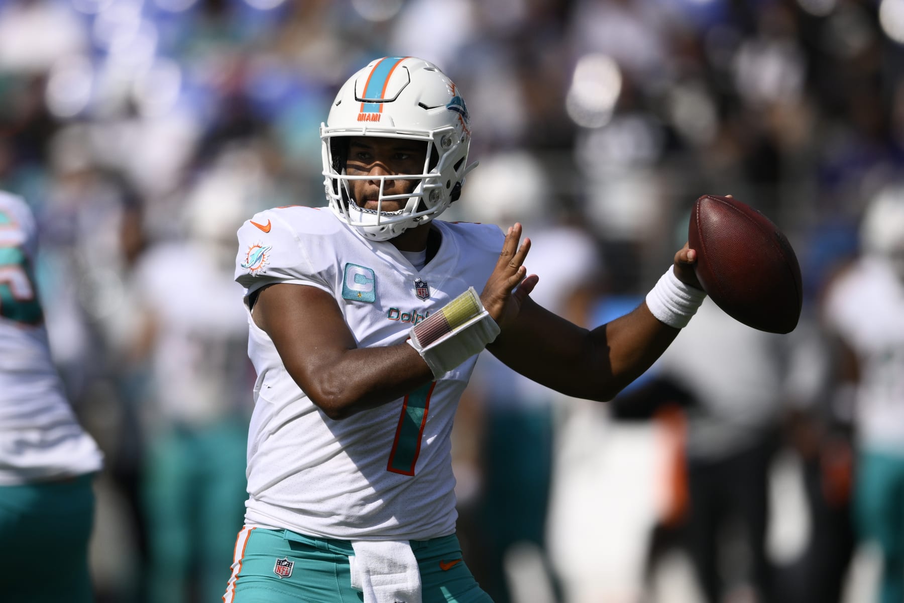 Miami Dolphins quarterback Tua Tagovailoa (1) in action during the second half of an NFL football game against the Baltimore Ravens, Sunday, Sept. 18, 2022, in Baltimore. (AP Photo/Nick Wass)