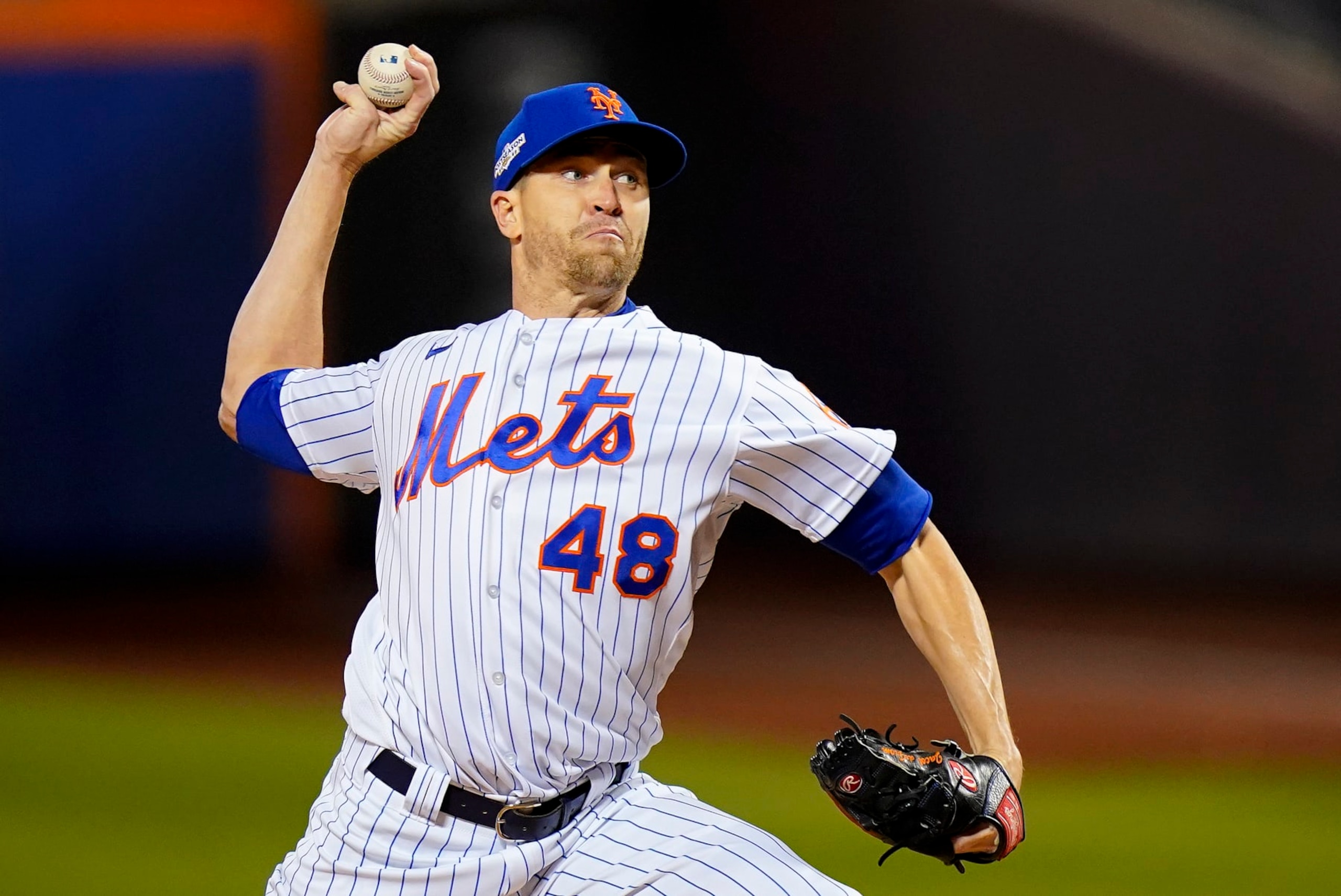 New York Mets starting pitcher Jacob deGrom (48) delivers against the San Diego Padres during the first inning of Game 2 of a National League wild-card baseball playoff series, Saturday, Oct. 8, 2022, in New York. (AP Photo/Frank Franklin II) New York Mets starting pitcher Jacob deGrom (48) delivers against the San Diego Padres during the first inning of Game 2 of a National League wild-card baseball playoff series, Saturday, Oct. 8, 2022, in New York. (AP Photo/Frank Franklin II)