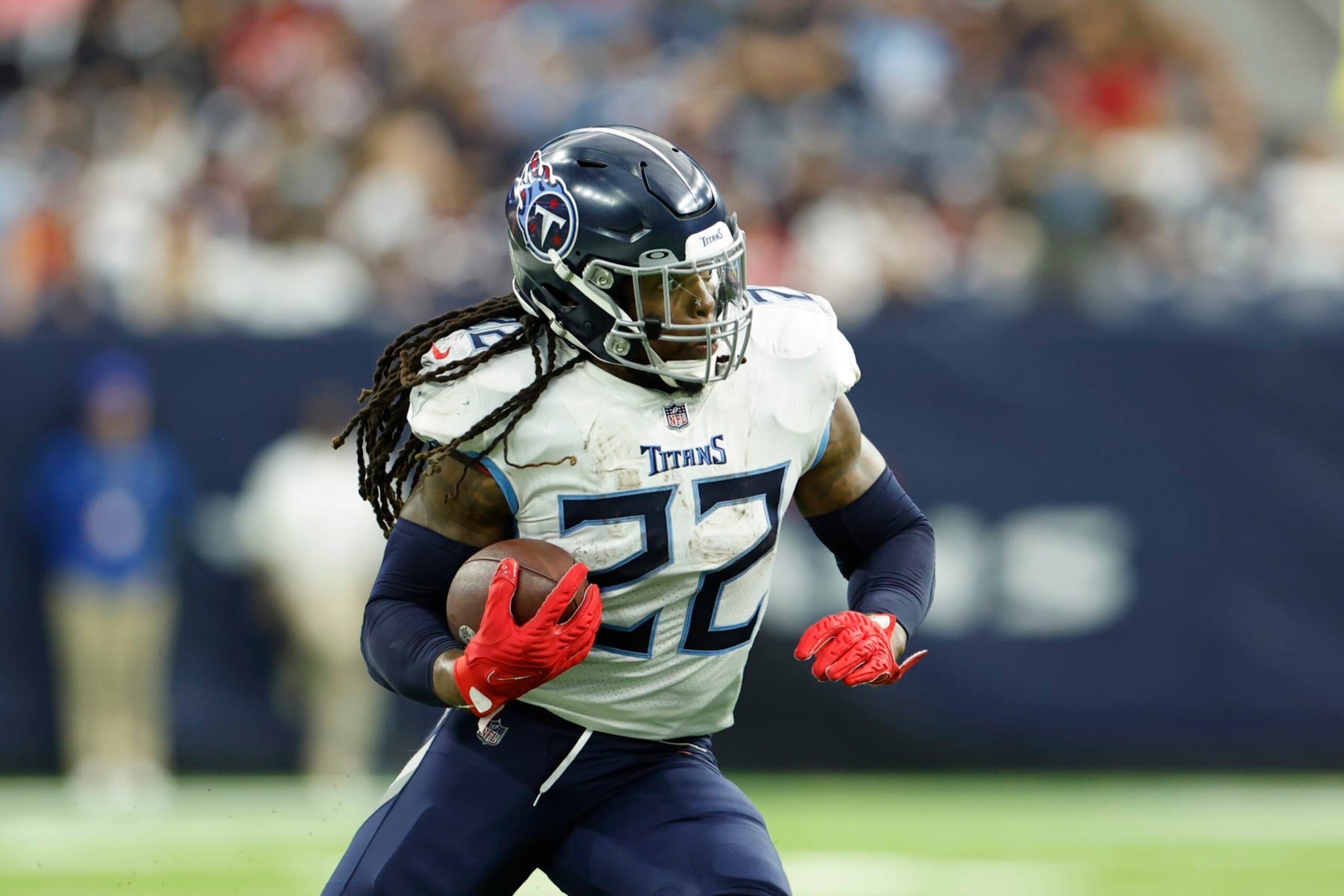 Tennessee Titans running back Derrick Henry (22) carries the ball during an NFL football game against the Houston Texans on Sunday, October 30, 2022, in Houston. (AP Photo/Matt Patterson) Tennessee Titans running back Derrick Henry (22) carries the ball during an NFL football game against the Houston Texans on Sunday, October 30, 2022, in Houston. (AP Photo/Matt Patterson)