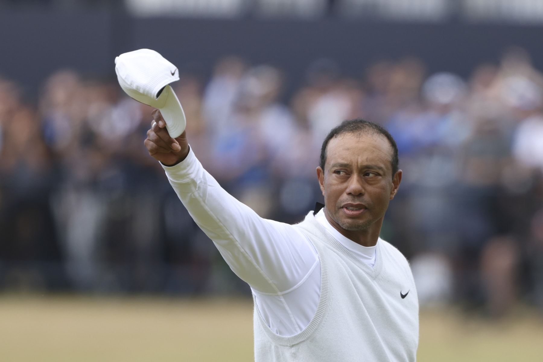 Tiger Woods of the US gestures to the crowd at the end of his second round of the British Open golf championship on the Old Course at St. Andrews, Scotland, Friday July 15, 2022. The Open Championship returns to the home of golf on July 14-17, 2022, to celebrate the 150th edition of the sport's oldest championship, which dates to 1860 and was first played at St. Andrews in 1873. (AP Photo/Peter Morrison) Tiger Woods of the US gestures to the crowd at the end of his second round of the British Open golf championship on the Old Course at St. Andrews, Scotland, Friday July 15, 2022. The Open Championship returns to the home of golf on July 14-17, 2022, to celebrate the 150th edition of the sport's oldest championship, which dates to 1860 and was first played at St. Andrews in 1873. (AP Photo/Peter Morrison)