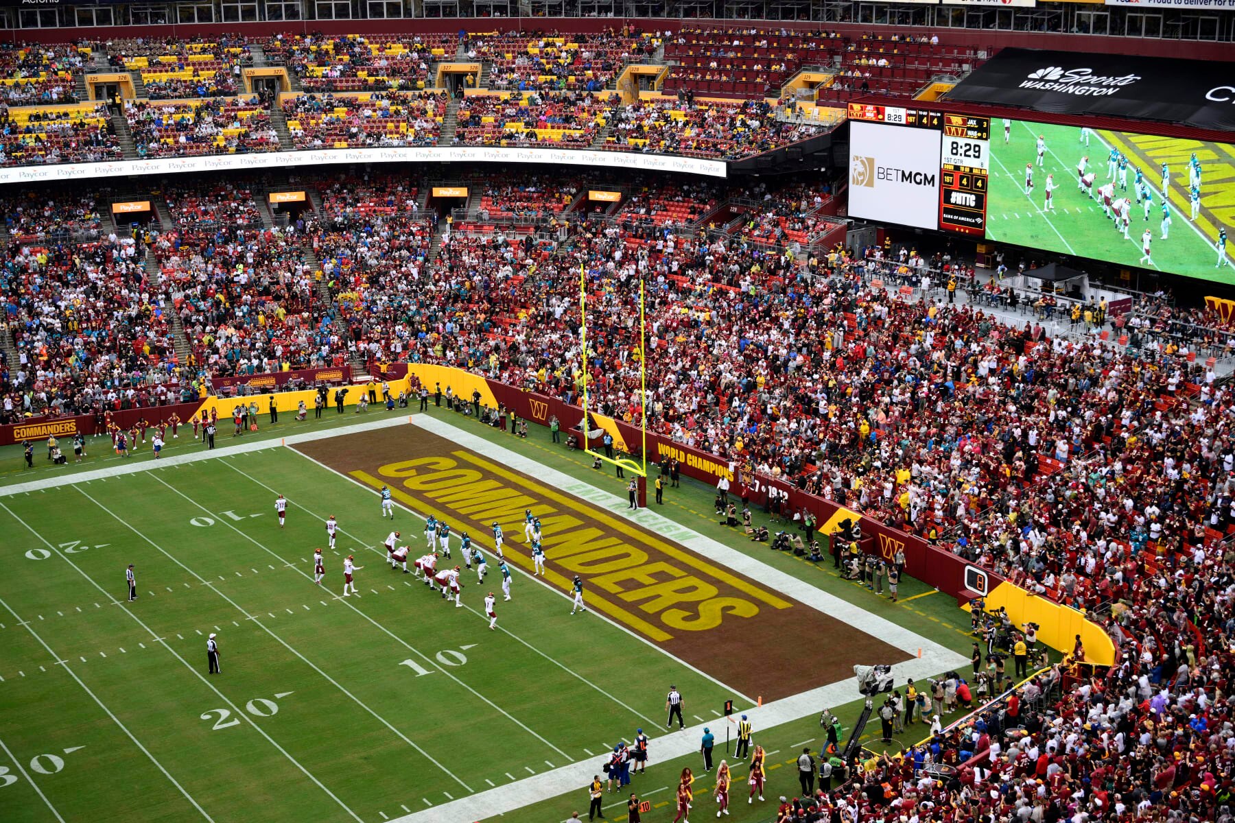 The Washington Commanders logo is seen in the end zone during a NFL football game between the Washington Commanders and the Jacksonville Jaguars, Sunday, Sept. 11, 2022, in Landover, Md. (AP Photo/Nick Wass)