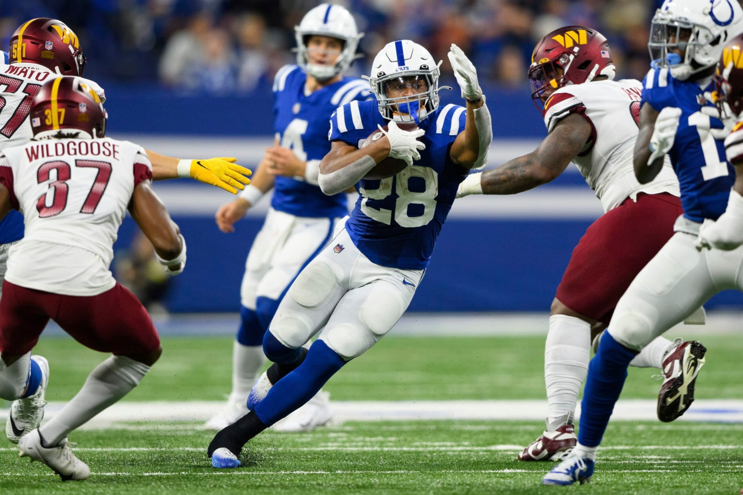 Indianapolis Colts running back Jonathan Taylor (28) runs up the middle during an NFL football game against the Washington Commanders, Sunday, Oct. 30, 2022, in Indianapolis. (AP Photo/Zach Bolinger) Indianapolis Colts running back Jonathan Taylor (28) runs up the middle during an NFL football game against the Washington Commanders, Sunday, Oct. 30, 2022, in Indianapolis. (AP Photo/Zach Bolinger)