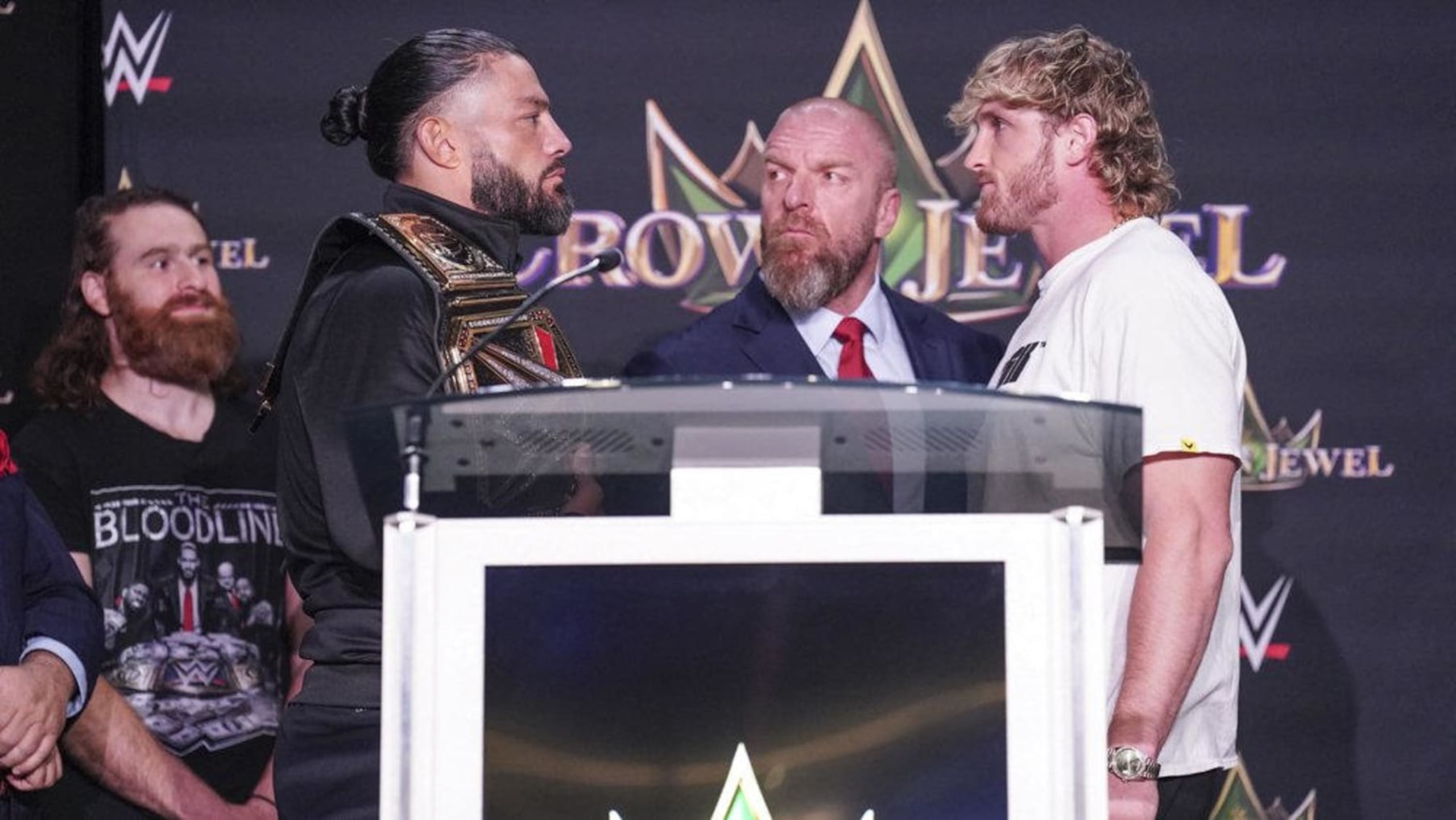 Roman Reigns and Logan Paul