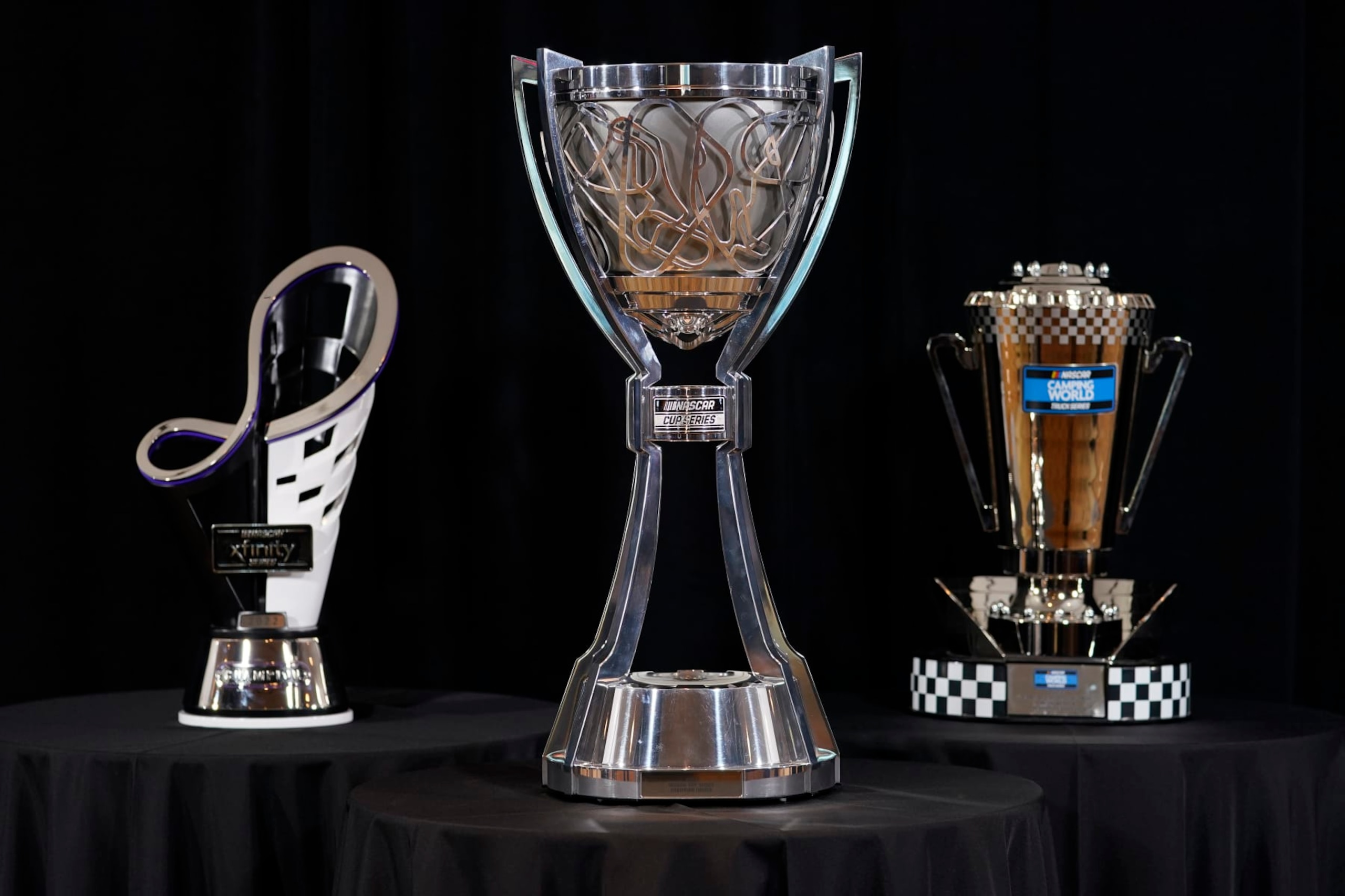 The NASCAR auto racing Xfinity, Camping World Truck and Cup Series championship trophies are displayed during the Championship media day, Thursday, Nov. 3, 2022, in Phoenix. (AP Photo/Matt York) The NASCAR auto racing Xfinity, Camping World Truck and Cup Series championship trophies are displayed during the Championship media day, Thursday, Nov. 3, 2022, in Phoenix. (AP Photo/Matt York)