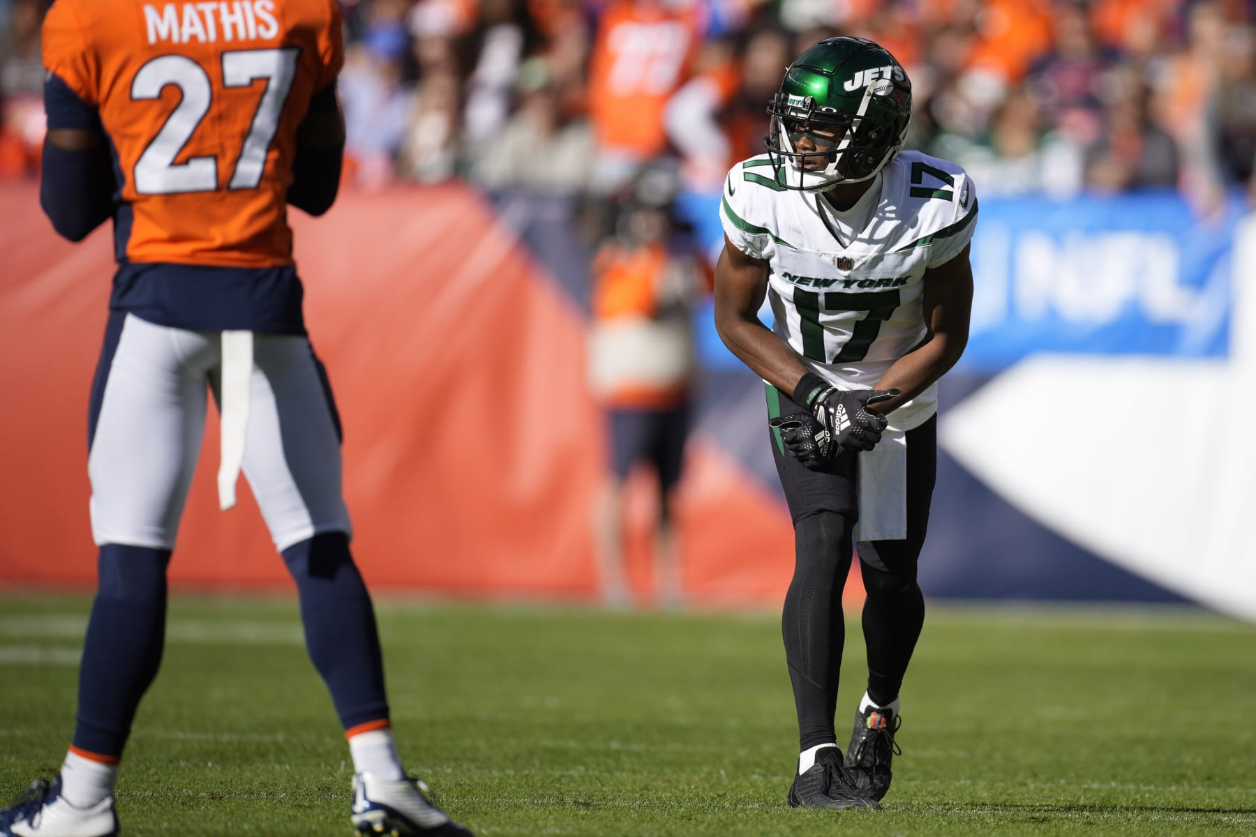 New York Jets wide receiver Garrett Wilson (17) lines up against the Denver Broncos during the first half of an NFL football game, Sunday, Oct. 23, 2022, in Denver. (AP Photo/David Zalubowski)