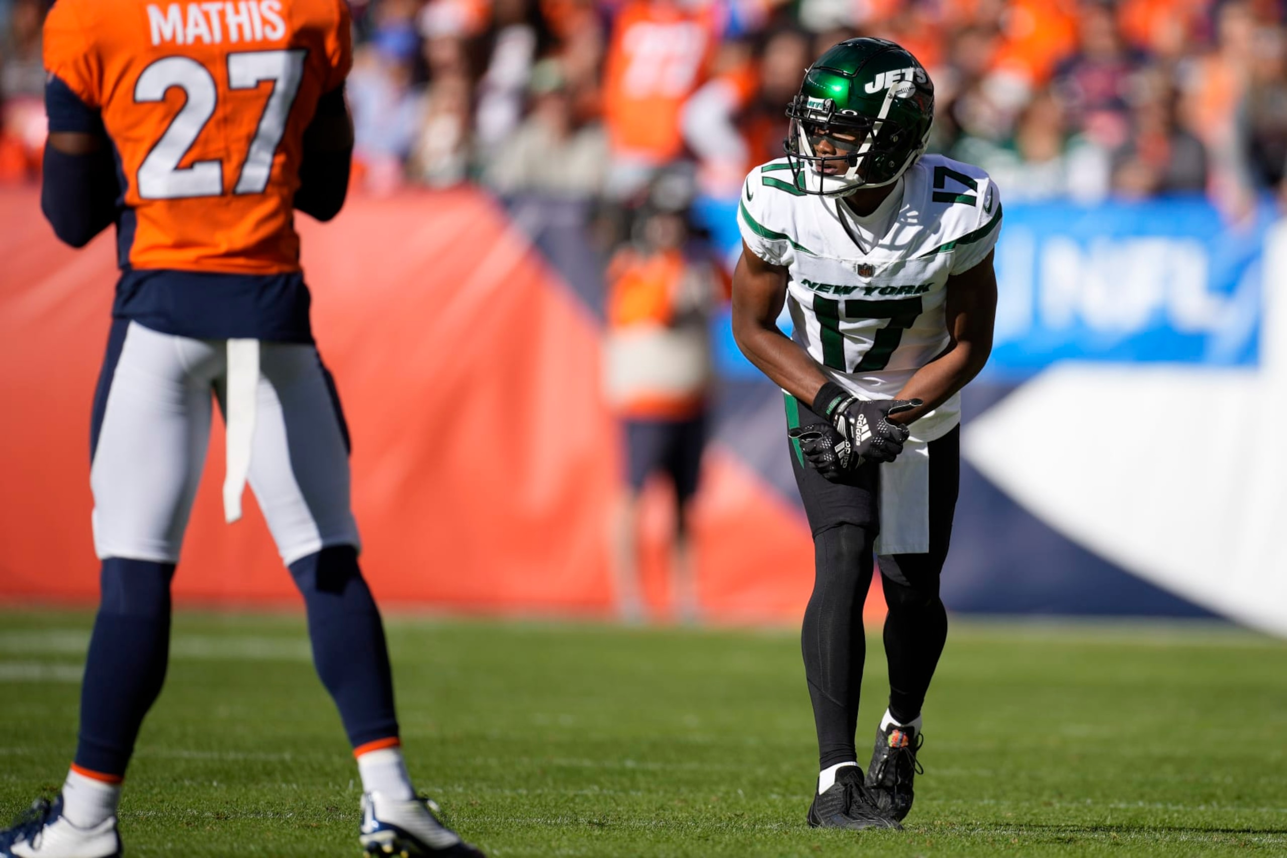 New York Jets wide receiver Garrett Wilson (17) lines up against the Denver Broncos during the first half of an NFL football game, Sunday, Oct. 23, 2022, in Denver. (AP Photo/David Zalubowski) New York Jets wide receiver Garrett Wilson (17) lines up against the Denver Broncos during the first half of an NFL football game, Sunday, Oct. 23, 2022, in Denver. (AP Photo/David Zalubowski)