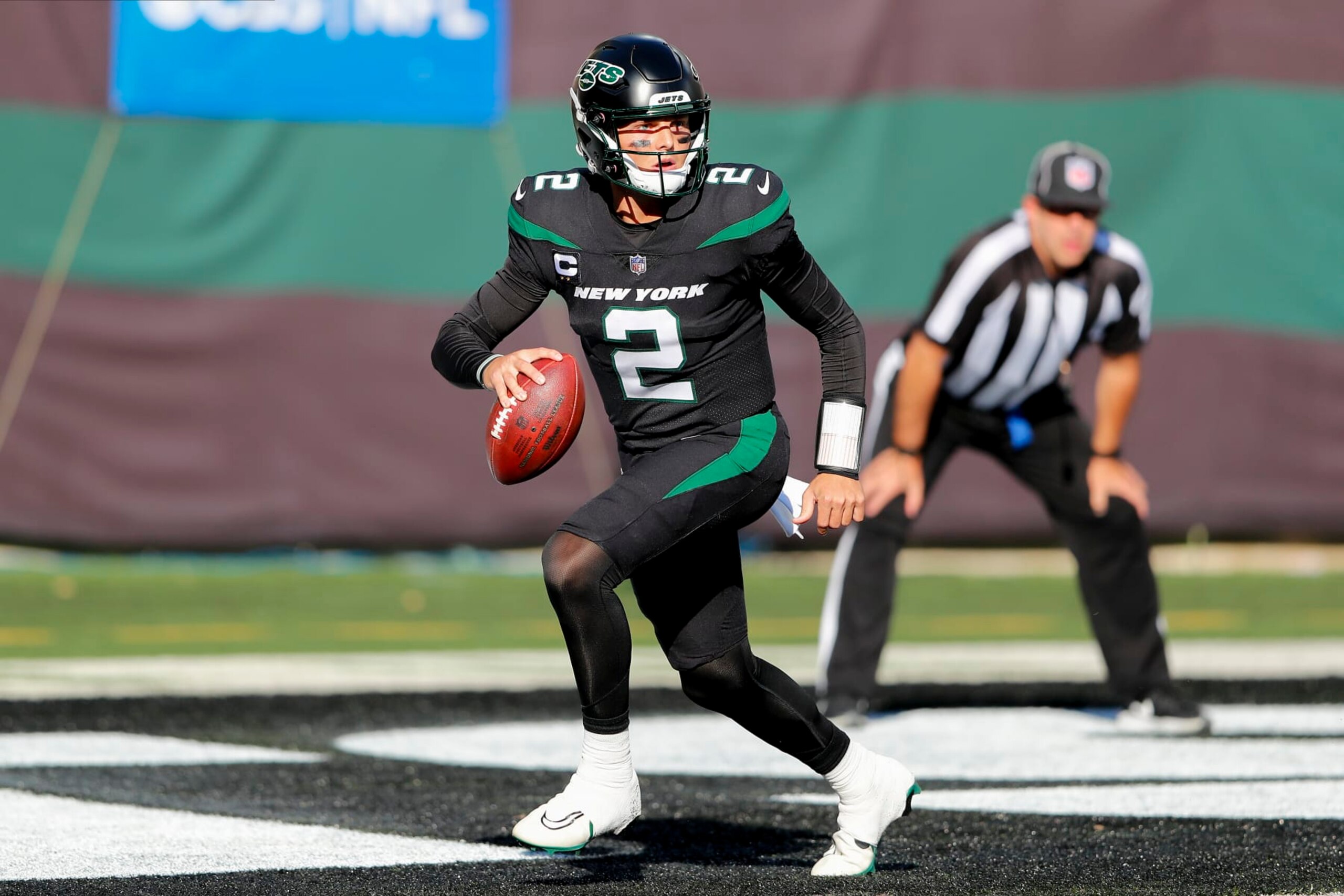 New York Jets quarterback Zach Wilson (2) looks to pass against the New England Patriots during the third quarter of an NFL football game, Sunday, Oct. 30, 2022, in New York. (AP Photo/Noah Murray) New York Jets quarterback Zach Wilson (2) looks to pass against the New England Patriots during the third quarter of an NFL football game, Sunday, Oct. 30, 2022, in New York. (AP Photo/Noah Murray)