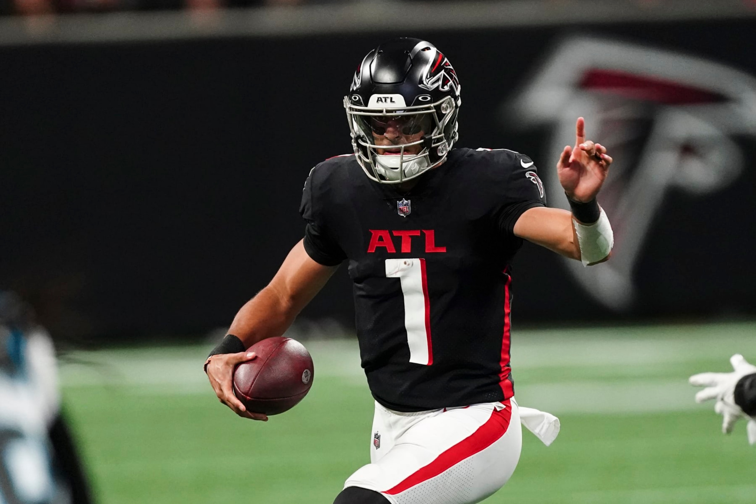Atlanta Falcons quarterback Marcus Mariota (1) is shown in action against the Carolina Panthers during an NFL football game Sunday, Oct. 30, 2022 in Atlanta. (AP Photo/John Bazemore) Atlanta Falcons quarterback Marcus Mariota (1) is shown in action against the Carolina Panthers during an NFL football game Sunday, Oct. 30, 2022 in Atlanta. (AP Photo/John Bazemore)