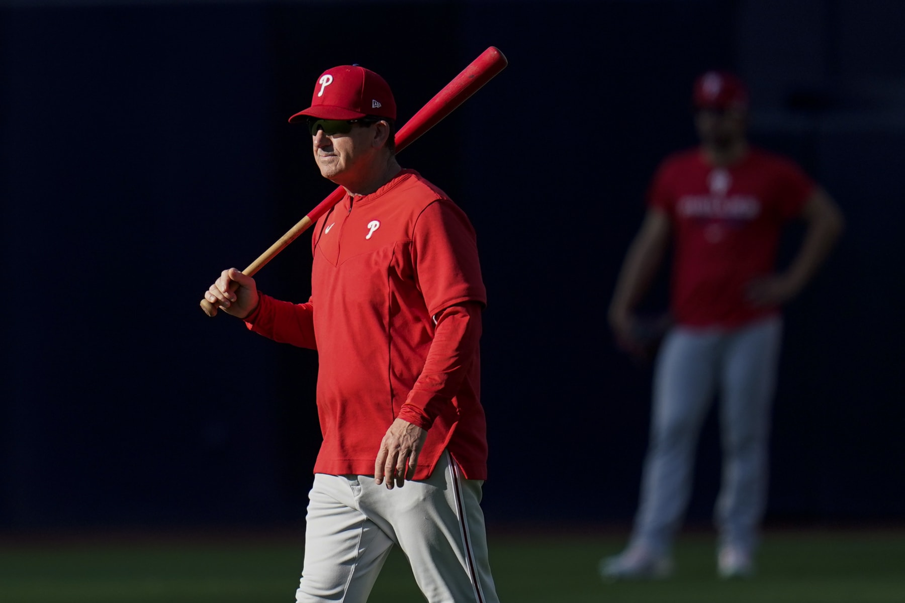 Philadelphia Phillies manager Rob Thomson looks on during practice ahead of Game 1 of the baseball NL Championship Series against the San Diego Padres, Monday, Oct. 17, 2022, in San Diego. The Padres host the Phillies for Game 1 Oct. 18. (AP Photo/Gregory Bull)