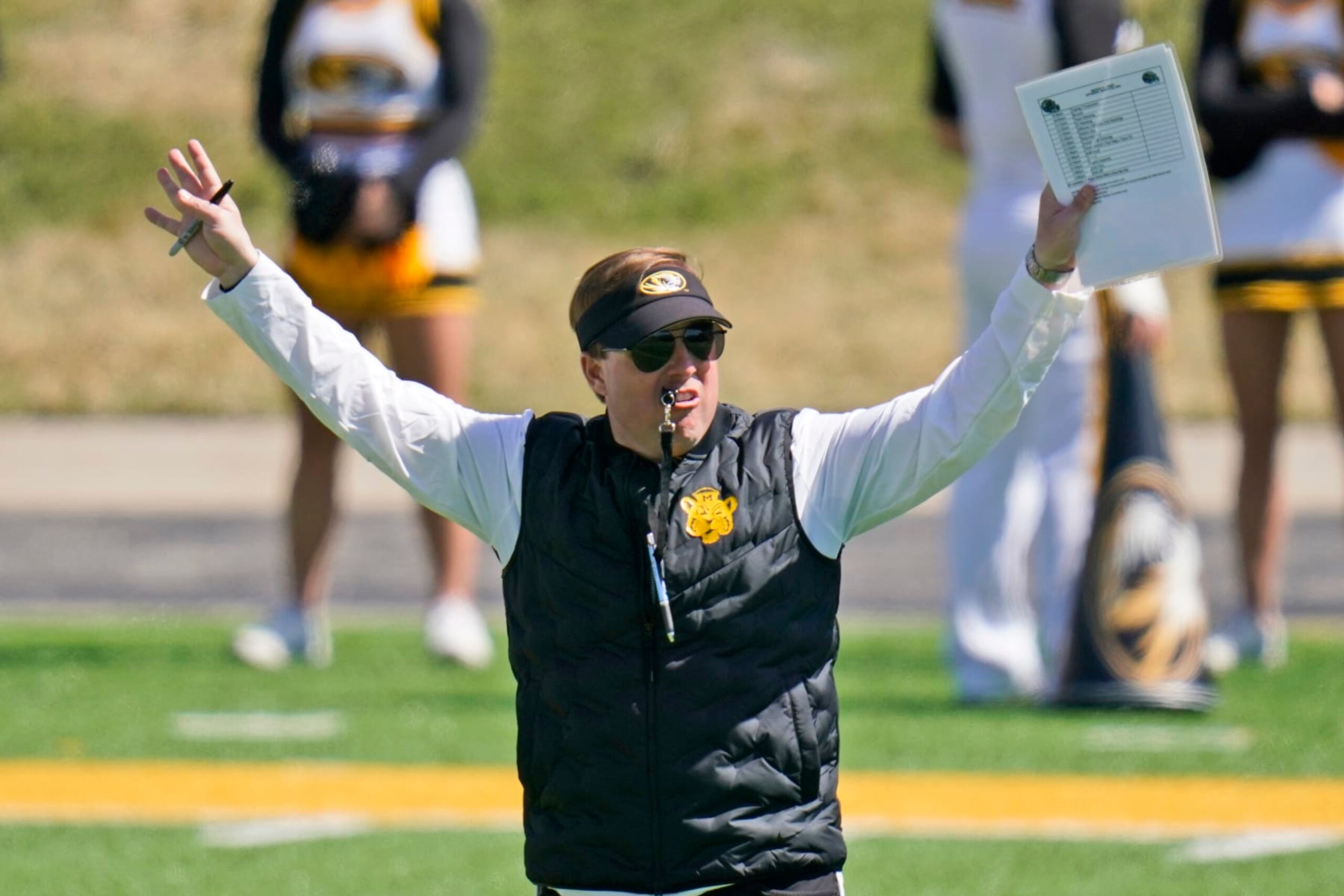 FILE - Missouri head coach Eliah Drinkwitz watches his team during an NCAA college football intra-squad spring game Saturday, March 19, 2022, in Columbia, Mo. Missouri coach Eli Drinkwitz welcomed 19 transfers among 50 newcomers to the Tigers this season, and 14 of them arrived from Division I schools. (AP Photo/Jeff Roberson, File) FILE - Missouri head coach Eliah Drinkwitz watches his team during an NCAA college football intra-squad spring game Saturday, March 19, 2022, in Columbia, Mo. Missouri coach Eli Drinkwitz welcomed 19 transfers among 50 newcomers to the Tigers this season, and 14 of them arrived from Division I schools. (AP Photo/Jeff Roberson, File)
