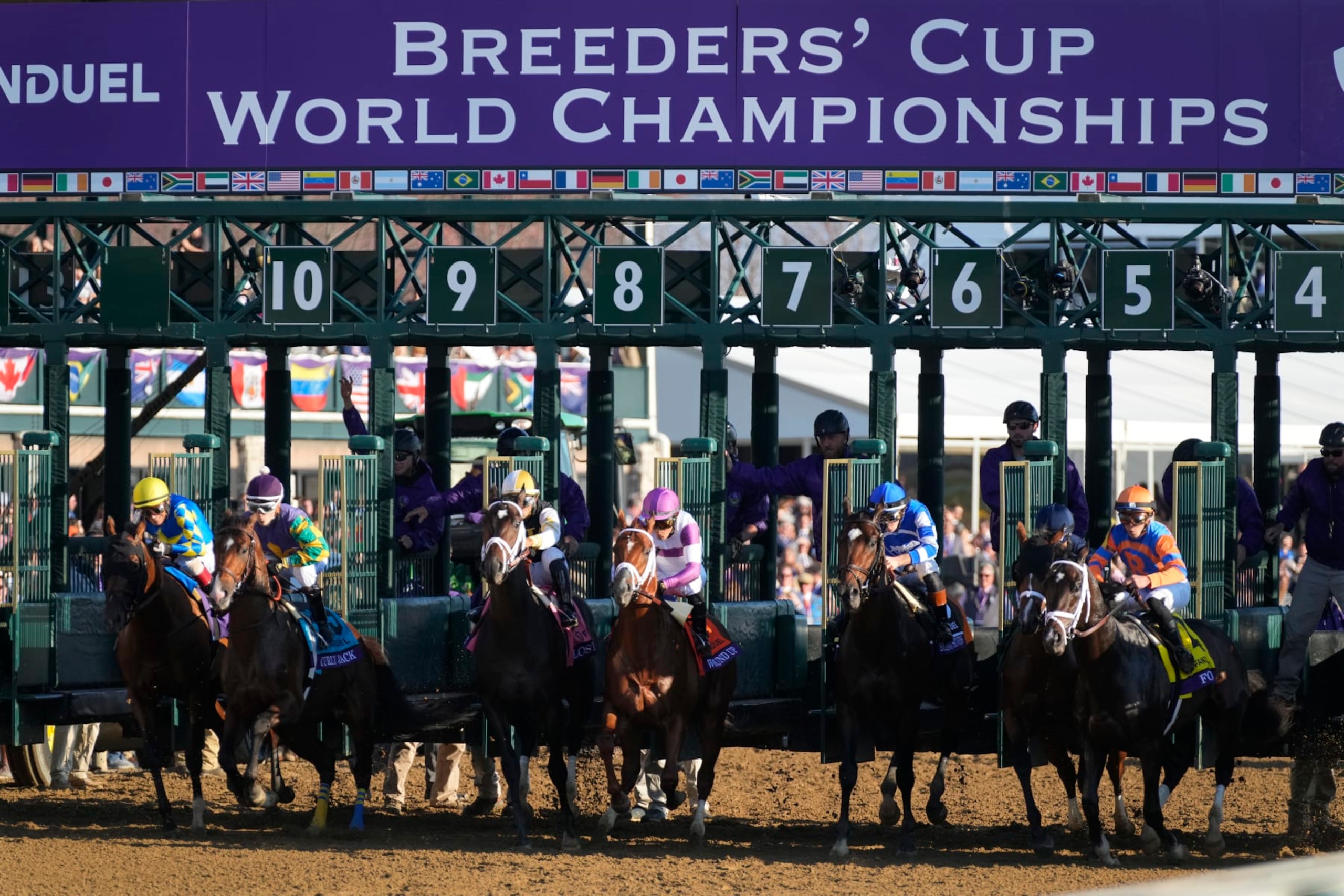 Irad Ortiz Jr. rides Forte, (4) far left, breaks out of the gate to win the Breeders' Cup Juvenile raceat the Keenelend Race Course, Friday, Nov. 4, 2022, in Lexington, Ky. (AP Photo/Jeff Roberson)