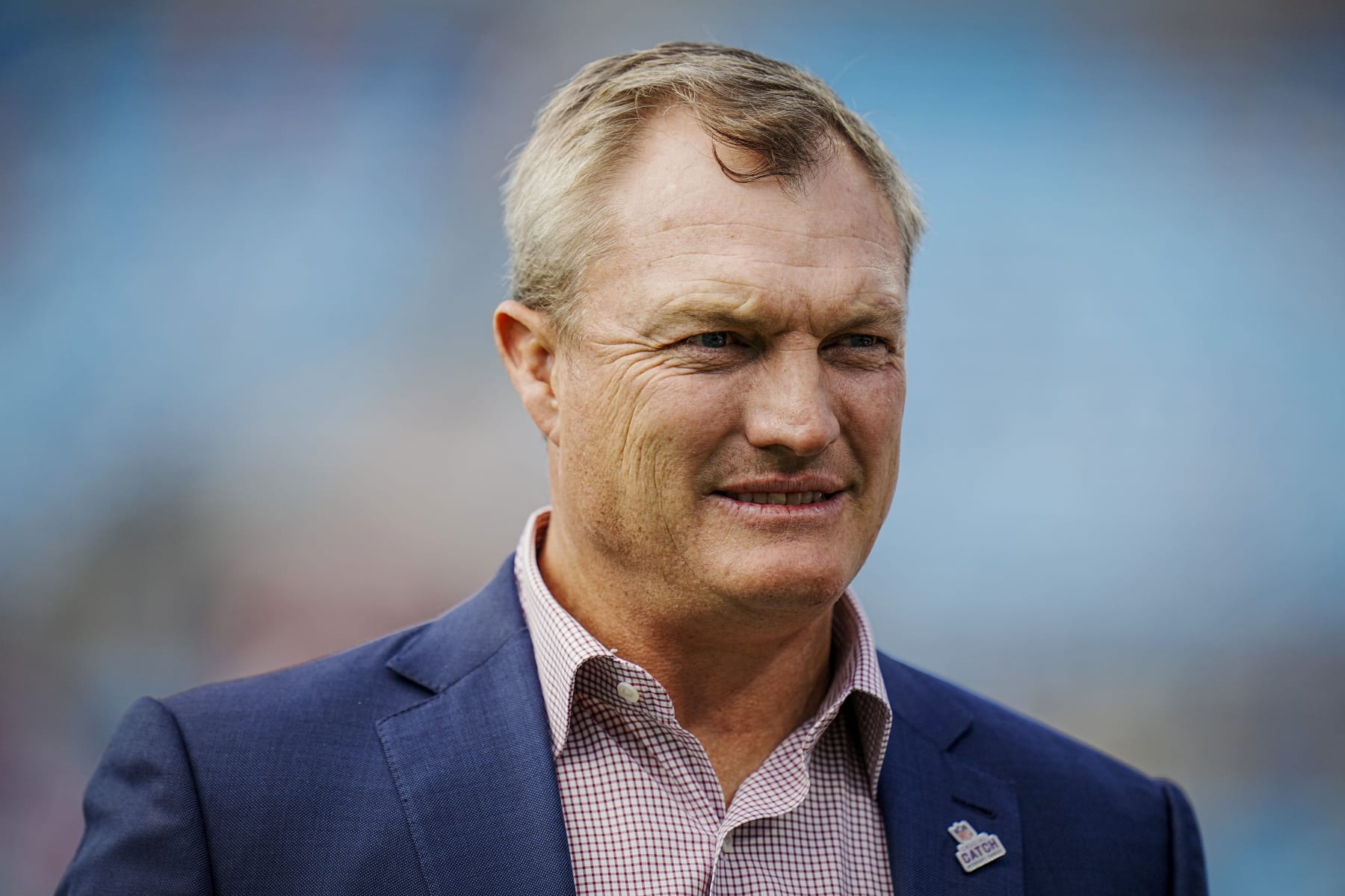 San Francisco 49ers general manager John Lynch walks the sidelines during an NFL football game against the Carolina Panthers on Sunday, Oct. 09, 2022, in Charlotte, N.C. (AP Photo/Rusty Jones)