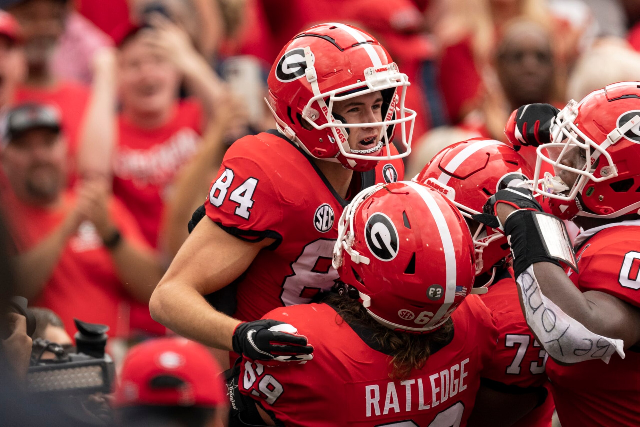 Georgia wide receiver Ladd McConkey (84) celebrates a touchdown catch with teammates during the first half of an NCAA college football game against Tennessee, Saturday, Nov. 5, 2022, in Athens, Ga. (AP Photo/John Bazemore) Georgia wide receiver Ladd McConkey (84) celebrates a touchdown catch with teammates during the first half of an NCAA college football game against Tennessee, Saturday, Nov. 5, 2022, in Athens, Ga. (AP Photo/John Bazemore)