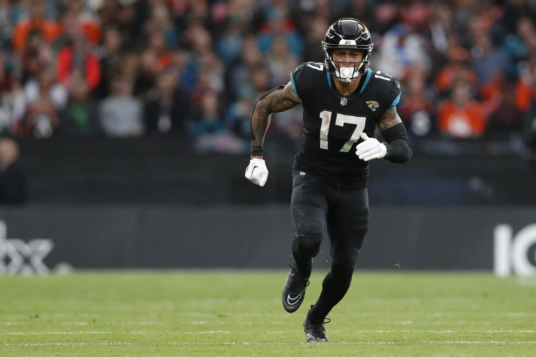 Jacksonville Jaguars tight end Evan Engram (17) runs a route during an NFL football game against the Denver Broncos at Wembley Stadium in London, Sunday, Oct. 30, 2022. The Denver Broncos defeated the Jacksonville Jaguars 21-17. (AP Photo/Steve Luciano)
