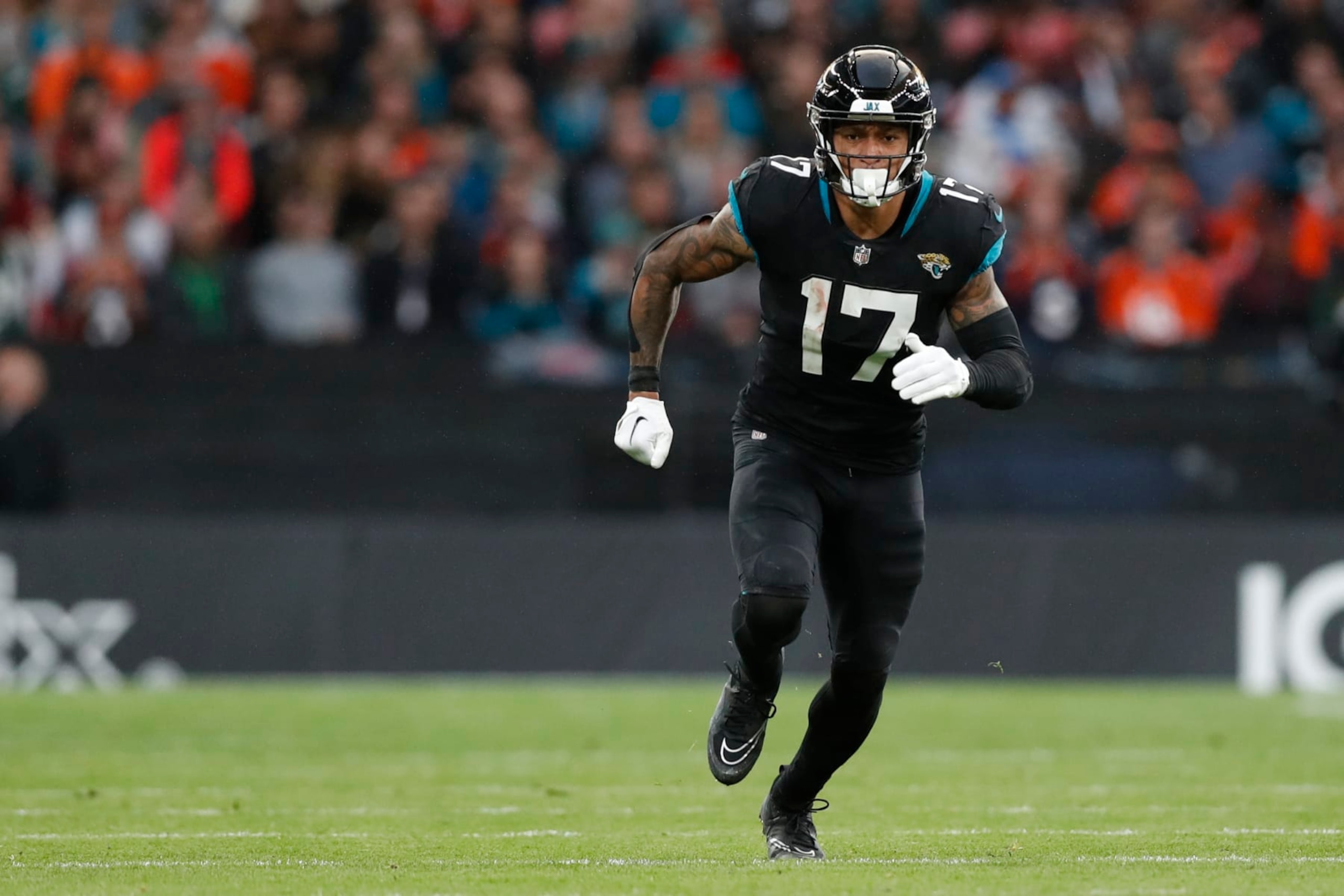 Jacksonville Jaguars tight end Evan Engram (17) runs a route during an NFL football game against the Denver Broncos at Wembley Stadium in London, Sunday, Oct. 30, 2022. The Denver Broncos defeated the Jacksonville Jaguars 21-17. (AP Photo/Steve Luciano) Jacksonville Jaguars tight end Evan Engram (17) runs a route during an NFL football game against the Denver Broncos at Wembley Stadium in London, Sunday, Oct. 30, 2022. The Denver Broncos defeated the Jacksonville Jaguars 21-17. (AP Photo/Steve Luciano)