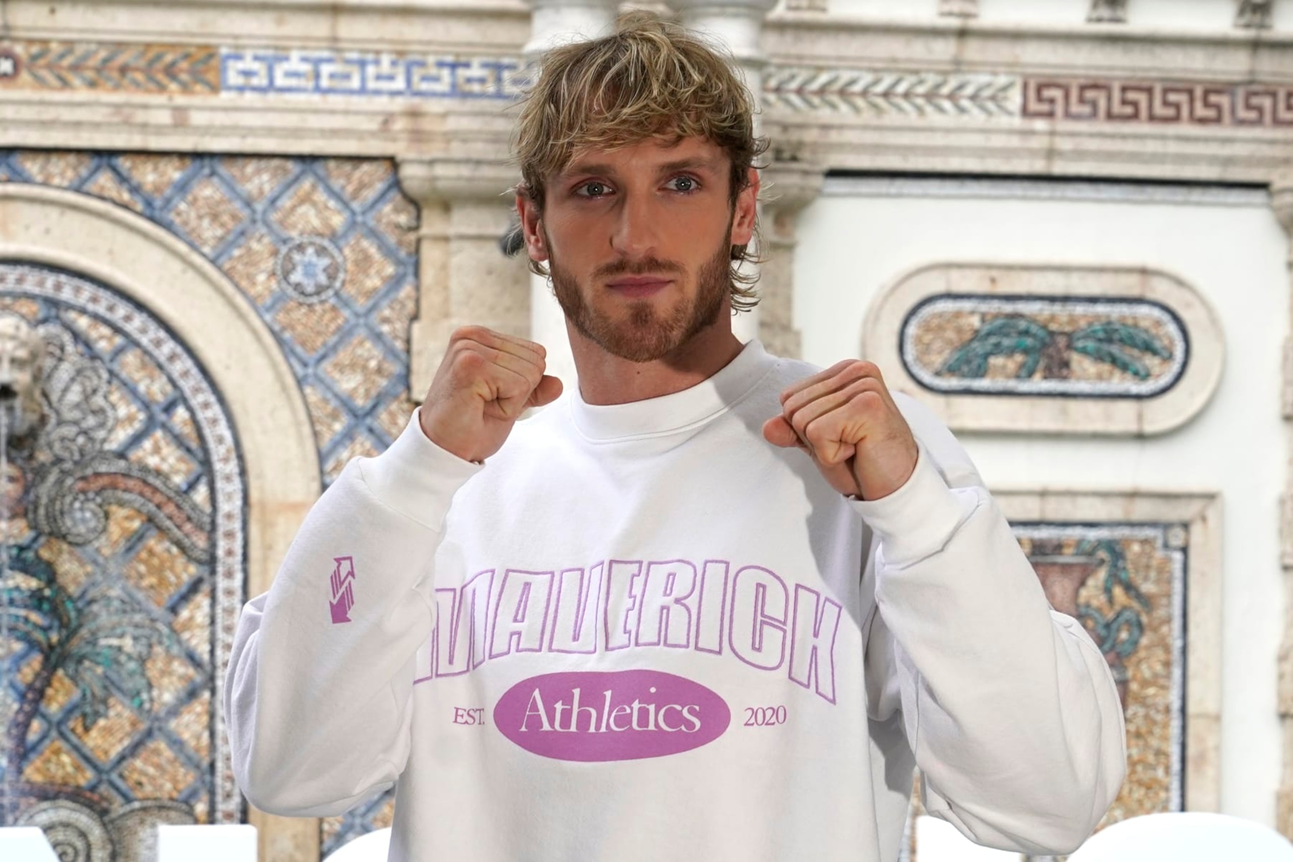 Logan Paul poses for a photograph during a press event, Thursday, June 3, 2021, in Miami Beach, Fla. Paul will fight Floyd Mayweather in an exhibition match at the Hard Rock Stadium in Miami Gardens, Fla. Sunday. (AP Photo/Lynne Sladky) Logan Paul poses for a photograph during a press event, Thursday, June 3, 2021, in Miami Beach, Fla. Paul will fight Floyd Mayweather in an exhibition match at the Hard Rock Stadium in Miami Gardens, Fla. Sunday. (AP Photo/Lynne Sladky)