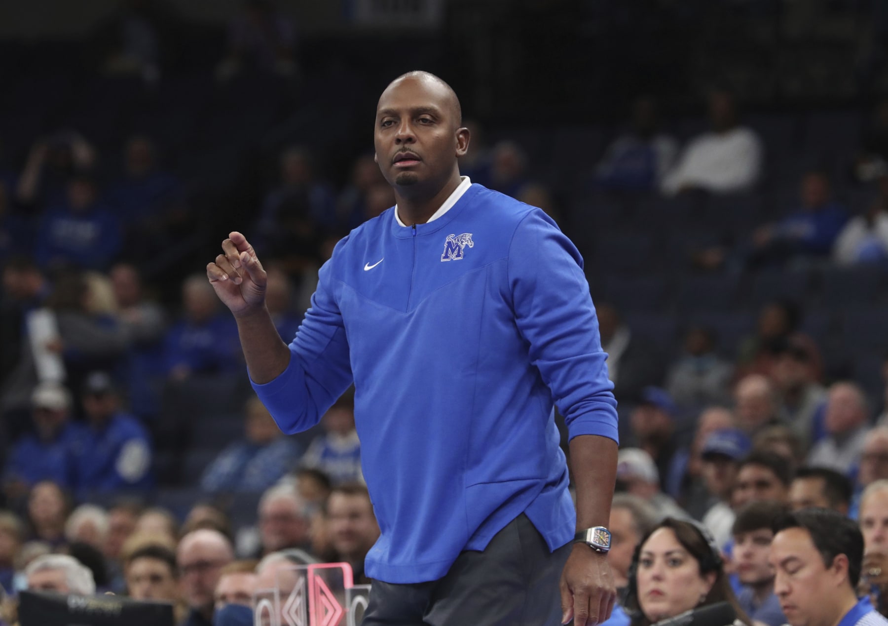 Memphis coach Penny Hardaway calls to his players during the first half of an NCAA college basketball game against Tennessee Tech, Tuesday, Nov. 9, 2021, in Memphis, Tenn. (AP Photo/Karen Pulfer Focht)