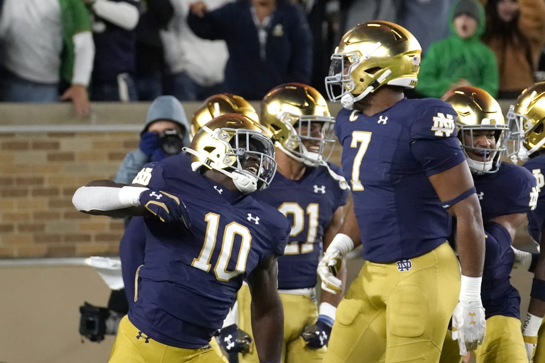 Notre Dame's Prince Kollie celebrates after scoring on the blocked of Clemson's Aidan Swanson's punt during the first half of an NCAA college football game Saturday, Nov. 5, 2022, in South Bend, Ind. (AP Photo/Charles Rex Arbogast)