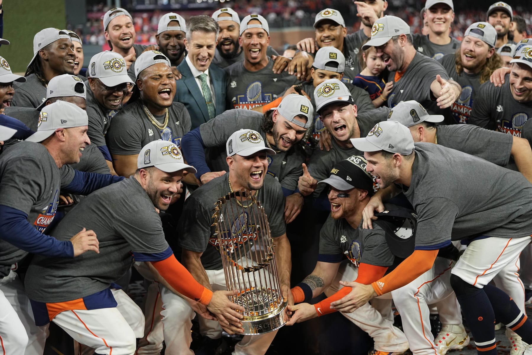 The Houston Astros celebrate with the trophy after their 4-1 World Series win against the Philadelphia Phillies in Game 6 on Saturday, Nov. 5, 2022, in Houston. (AP Photo/David J. Phillip)