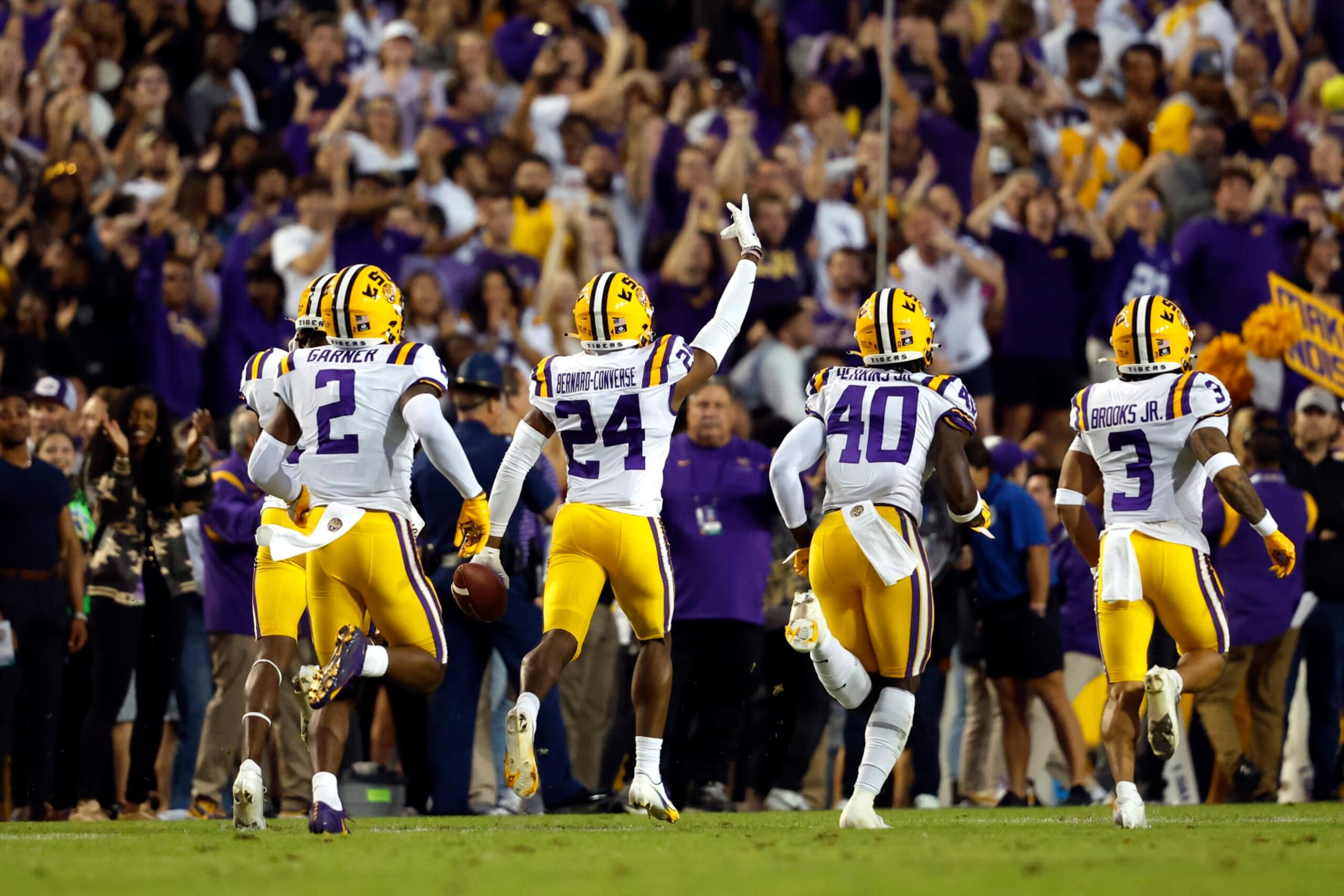 LSU cornerback Jarrick Bernard-Converse (24) celebrates after making an interception during the first half of an NCAA college football game against Alabama in Baton Rouge, La., Saturday, Nov. 5, 2022. (AP Photo/Tyler Kaufman) LSU cornerback Jarrick Bernard-Converse (24) celebrates after making an interception during the first half of an NCAA college football game against Alabama in Baton Rouge, La., Saturday, Nov. 5, 2022. (AP Photo/Tyler Kaufman)