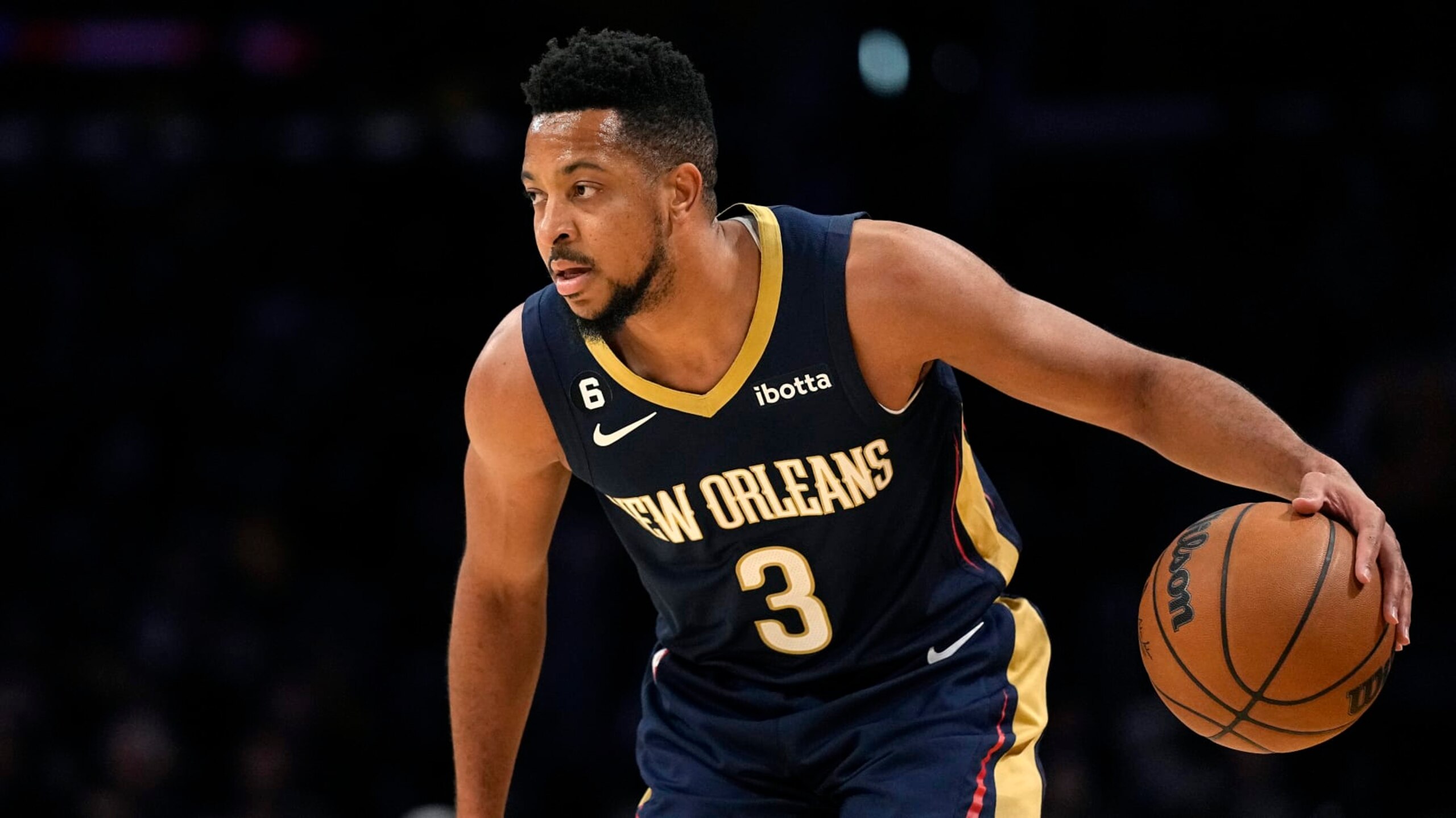 New Orleans Pelicans guard CJ McCollum dribbles during the first half of an NBA basketball game against the Los Angeles Lakers Wednesday, Nov. 2, 2022, in Los Angeles. (AP Photo/Mark J. Terrill)
