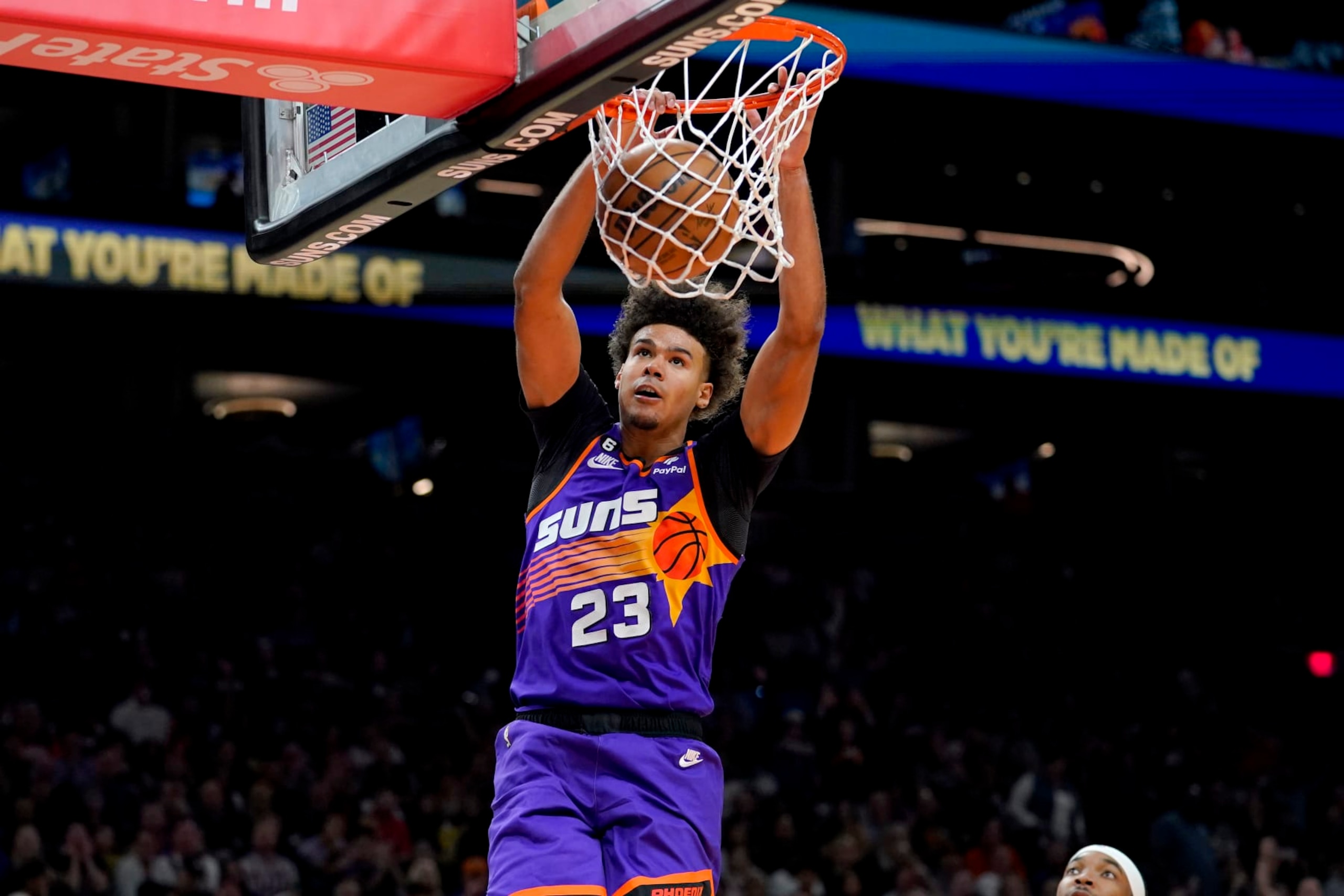 Phoenix Suns forward Cameron Johnson (23) dunks the ball against the New Orleans Pelicans during the second half of an NBA basketball game, Friday, Oct. 28, 2022, in Phoenix. (AP Photo/Matt York)