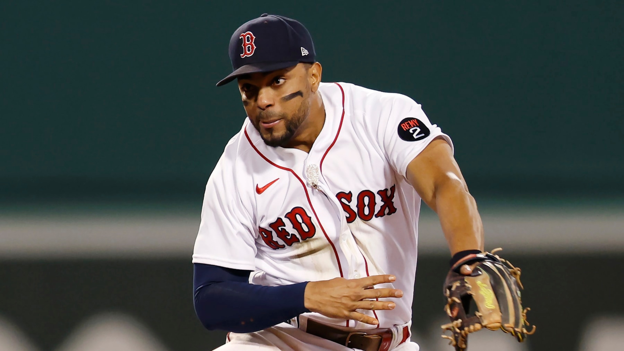 Boston Red Sox's Xander Bogaerts turns the double play on Austin Hays to end the baseball game in the ninth inning, Tuesday, Sept. 27, 2022, in Boston. (AP Photo/Michael Dwyer)