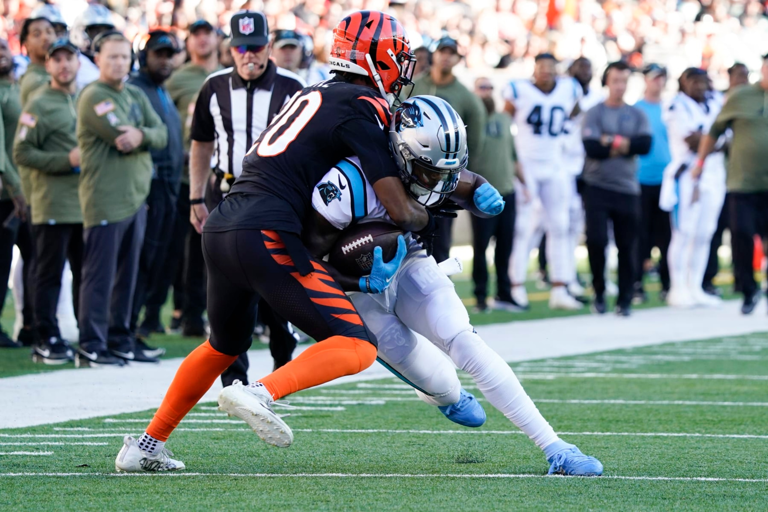 Carolina Panthers wide receiver Terrace Marshall Jr., right, makes a catch as Cincinnati Bengals cornerback Eli Apple (20) defends during the second half of an NFL football game, Sunday, Nov. 6, 2022, in Cincinnati. (AP Photo/Joshua A. Bickel) Carolina Panthers wide receiver Terrace Marshall Jr., right, makes a catch as Cincinnati Bengals cornerback Eli Apple (20) defends during the second half of an NFL football game, Sunday, Nov. 6, 2022, in Cincinnati. (AP Photo/Joshua A. Bickel)