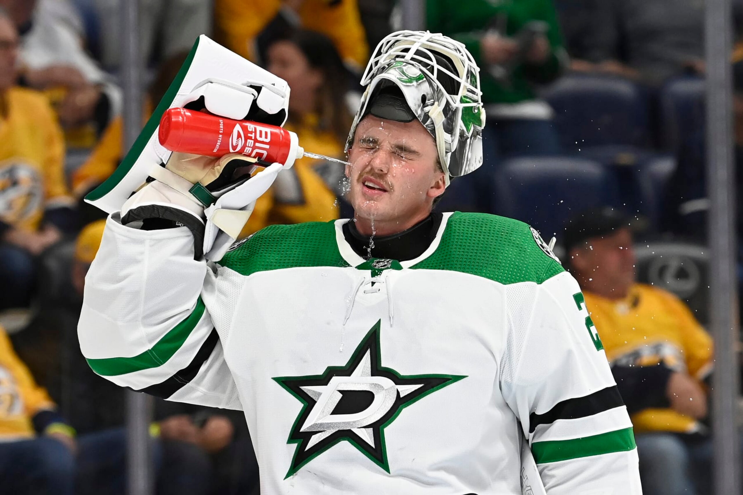Dallas Stars goaltender Jake Oettinger (29) sprays his face with water during the second period of an NHL hockey game against the Nashville Predators Thursday, Oct. 13, 2022, in Nashville, Tenn. (AP Photo/Mark Zaleski) Dallas Stars goaltender Jake Oettinger (29) sprays his face with water during the second period of an NHL hockey game against the Nashville Predators Thursday, Oct. 13, 2022, in Nashville, Tenn. (AP Photo/Mark Zaleski)