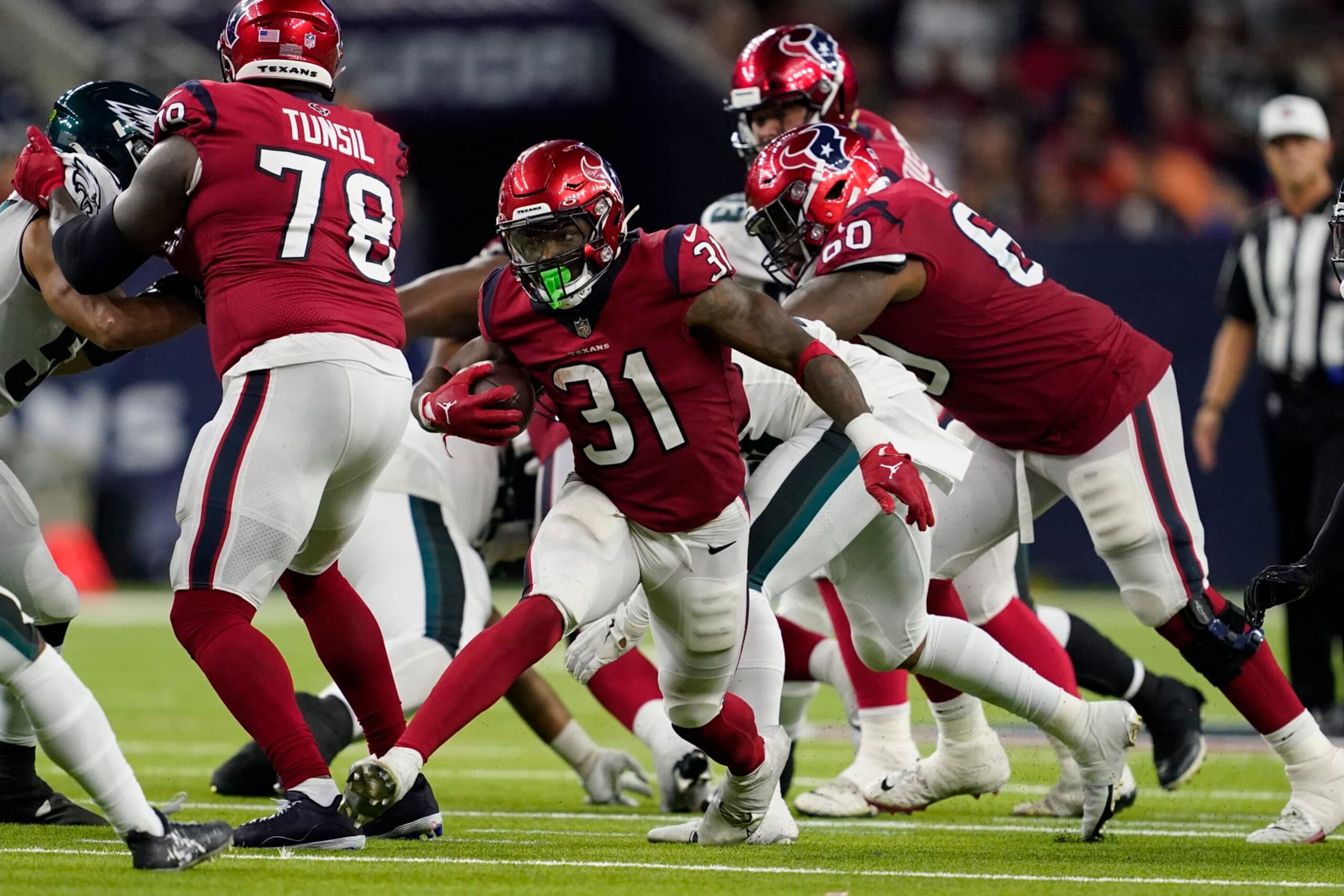 Houston Texans running back Dameon Pierce (31) carries in the second half of an NFL football game against the Philadelphia Eagles in Houston, Thursday, Nov. 3, 2022. The Eagles won 29-17. (AP Photo/Tony Gutierrez) Houston Texans running back Dameon Pierce (31) carries in the second half of an NFL football game against the Philadelphia Eagles in Houston, Thursday, Nov. 3, 2022. The Eagles won 29-17. (AP Photo/Tony Gutierrez)