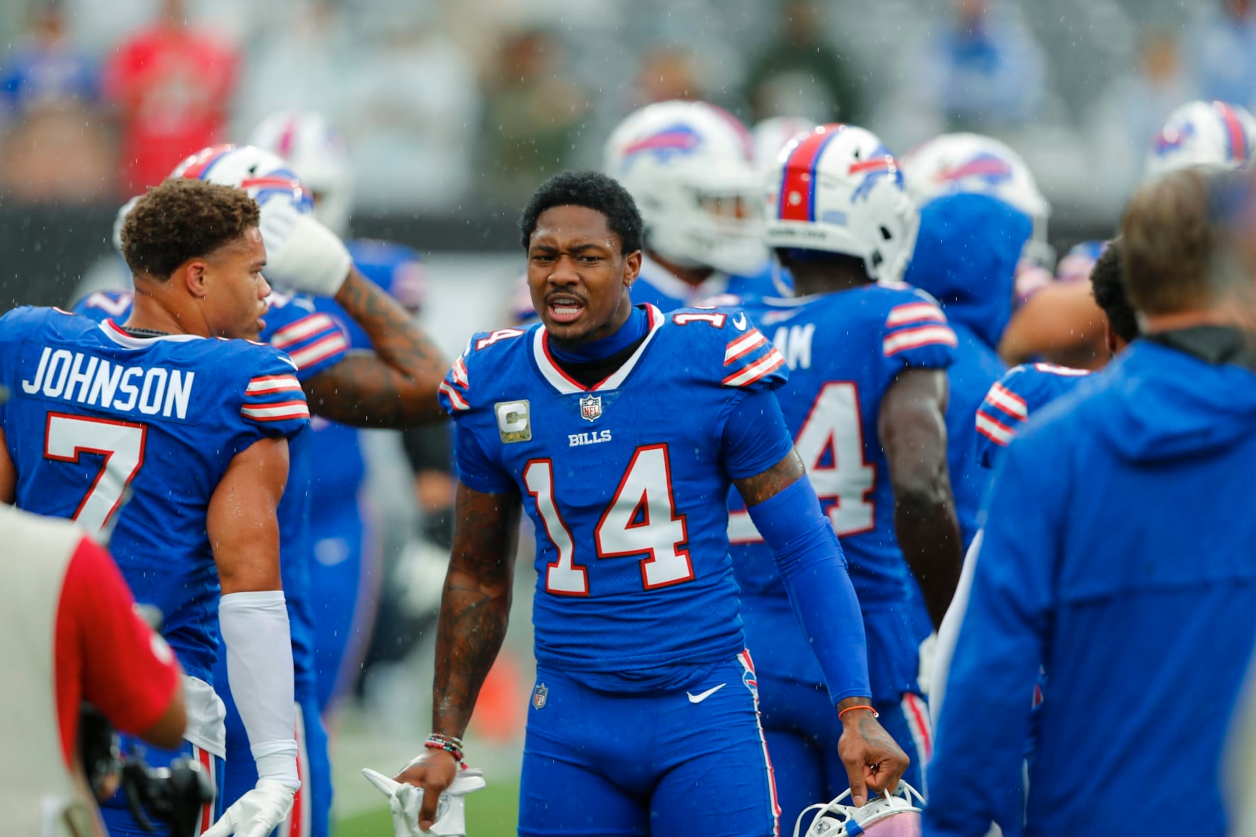 Buffalo Bills wide receiver Stefon Diggs (14) talks to teammates before an NFL football game against the New York Jets, Sunday, Nov. 6, 2022, in East Rutherford, N.J. (AP Photo/Noah K. Murray) Buffalo Bills wide receiver Stefon Diggs (14) talks to teammates before an NFL football game against the New York Jets, Sunday, Nov. 6, 2022, in East Rutherford, N.J. (AP Photo/Noah K. Murray)