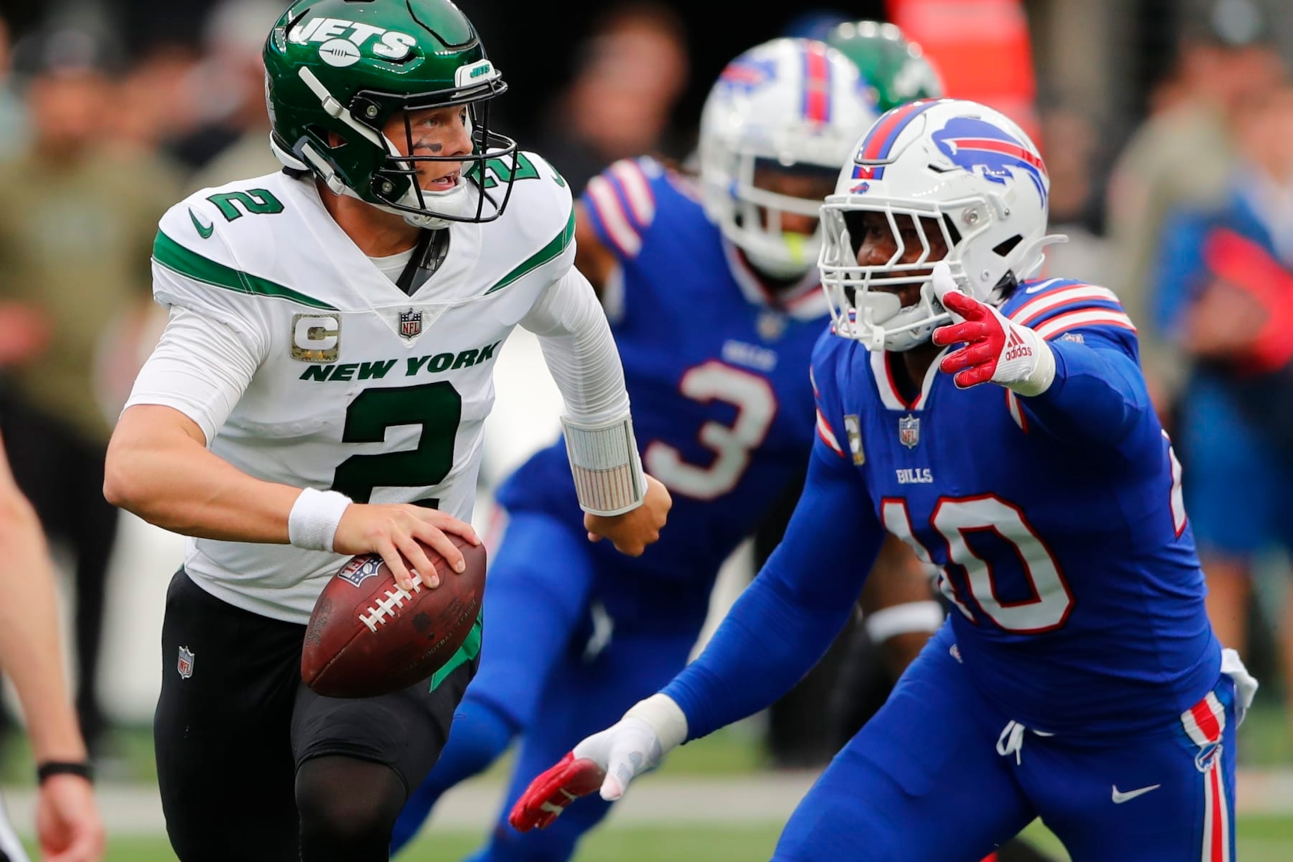 New York Jets quarterback Zach Wilson (2) looks to pass as Buffalo Bills' Von Miller (40) closes in during the second half of an NFL football game, Sunday, Nov. 6, 2022, in East Rutherford, N.J. (AP Photo/Noah K. Murray) New York Jets quarterback Zach Wilson (2) looks to pass as Buffalo Bills' Von Miller (40) closes in during the second half of an NFL football game, Sunday, Nov. 6, 2022, in East Rutherford, N.J. (AP Photo/Noah K. Murray)