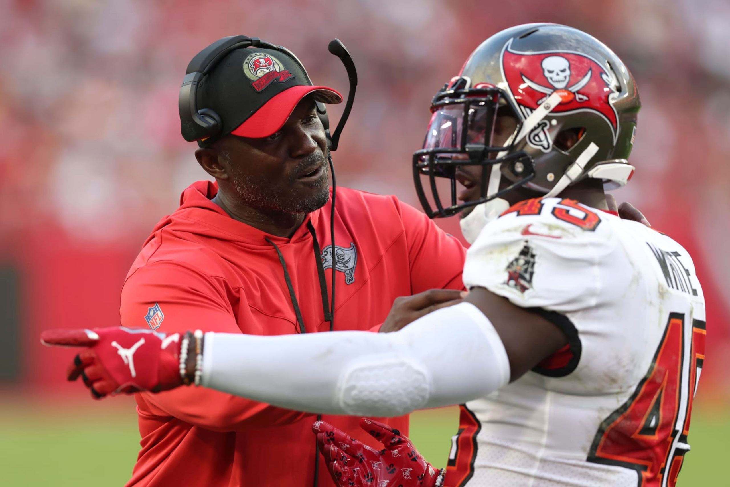 Tampa Bay Buccaneers head coach Todd Bowles speaks to linebacker Devin White during the first half of an NFL football game between the Los Angeles Rams and Tampa Bay Buccaneers, Sunday, Nov. 6, 2022, in Tampa, Fla. (AP Photo/Mark LoMoglio) Tampa Bay Buccaneers head coach Todd Bowles speaks to linebacker Devin White during the first half of an NFL football game between the Los Angeles Rams and Tampa Bay Buccaneers, Sunday, Nov. 6, 2022, in Tampa, Fla. (AP Photo/Mark LoMoglio)