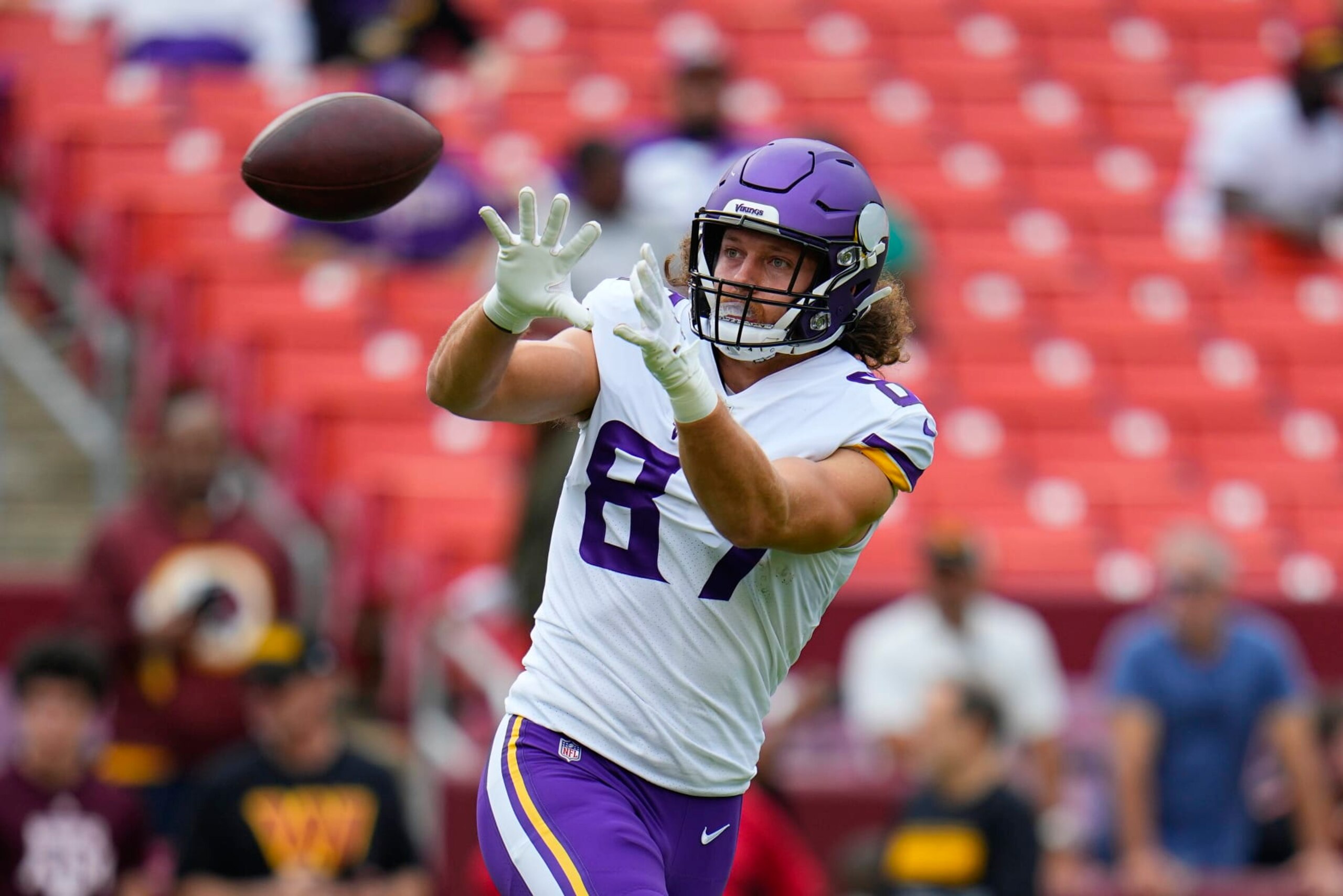 Minnesota Vikings tight end T.J. Hockenson (87) catches a ball before the start of an NFL football game against the Washington Commanders, Sunday, Nov. 6, 2022, in Landover, Md. (AP Photo/Julio Cortez) Minnesota Vikings tight end T.J. Hockenson (87) catches a ball before the start of an NFL football game against the Washington Commanders, Sunday, Nov. 6, 2022, in Landover, Md. (AP Photo/Julio Cortez)