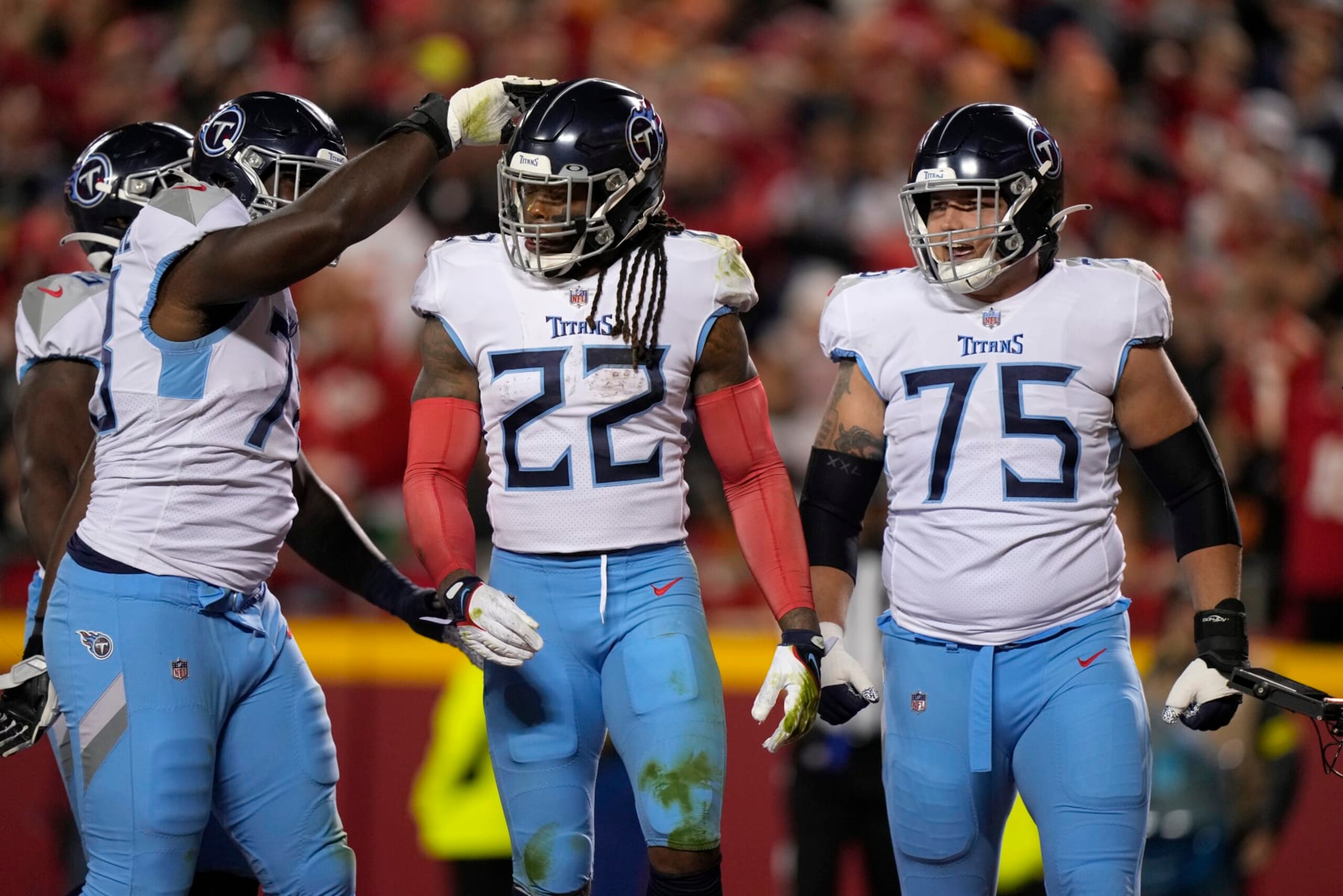 Tennessee Titans running back Derrick Henry (22) is congratulated by teammates after scoring during the first half of an NFL football game against the Kansas City Chiefs Sunday, Nov. 6, 2022, in Kansas City, Mo. (AP Photo/Charlie Riedel) Tennessee Titans running back Derrick Henry (22) is congratulated by teammates after scoring during the first half of an NFL football game against the Kansas City Chiefs Sunday, Nov. 6, 2022, in Kansas City, Mo. (AP Photo/Charlie Riedel)