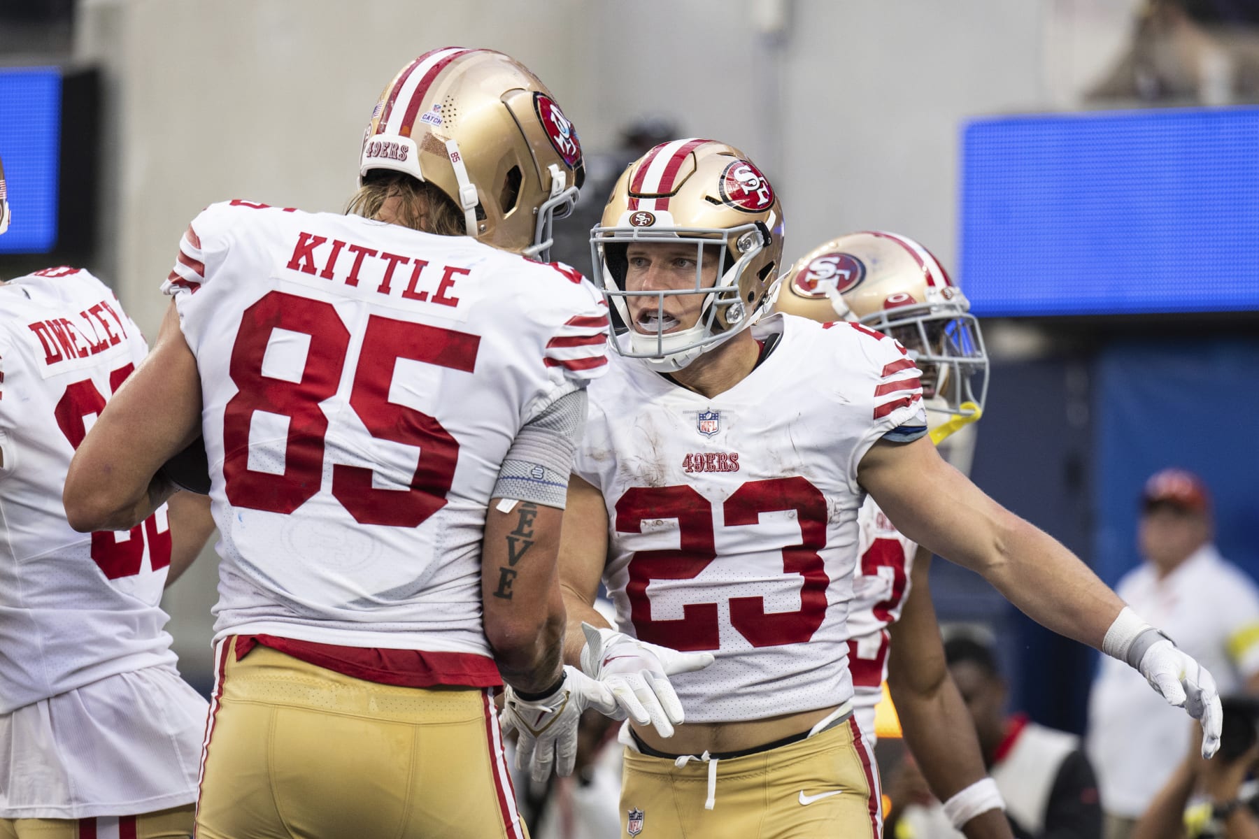 San Francisco 49ers running back Christian McCaffrey (23) and tight end George Kittle (85) celebrate McCaffrey's touchdown during an NFL football game against the Los Angeles Rams, Sunday, Oct. 30, 2022, in Inglewood, Calif. (AP Photo/Kyusung Gong)