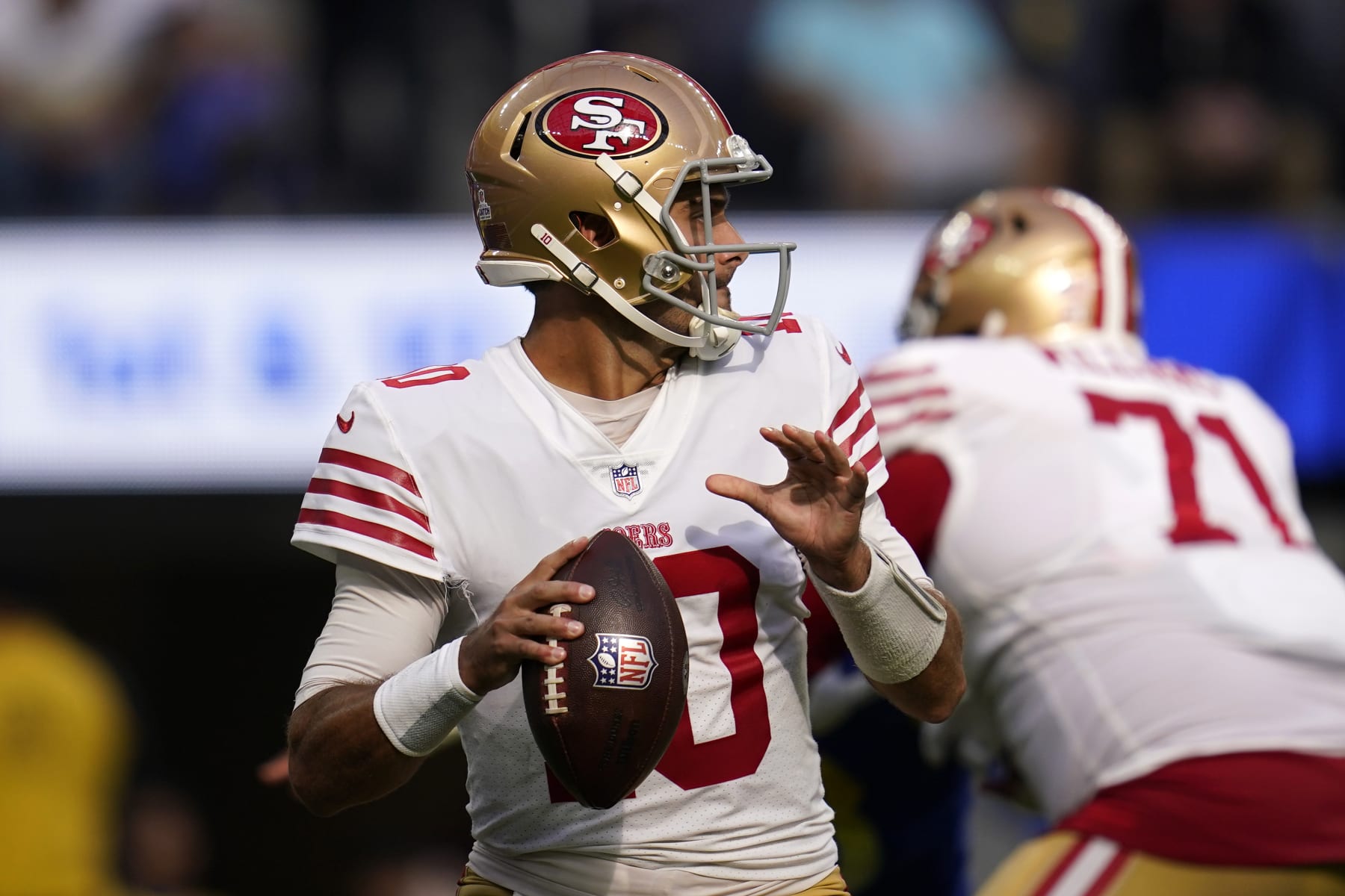 San Francisco 49ers quarterback Jimmy Garoppolo passes during the second half of an NFL football game against the Los Angeles Rams Sunday, Oct. 30, 2022, in Inglewood, Calif. (AP Photo/Ashley Landis)