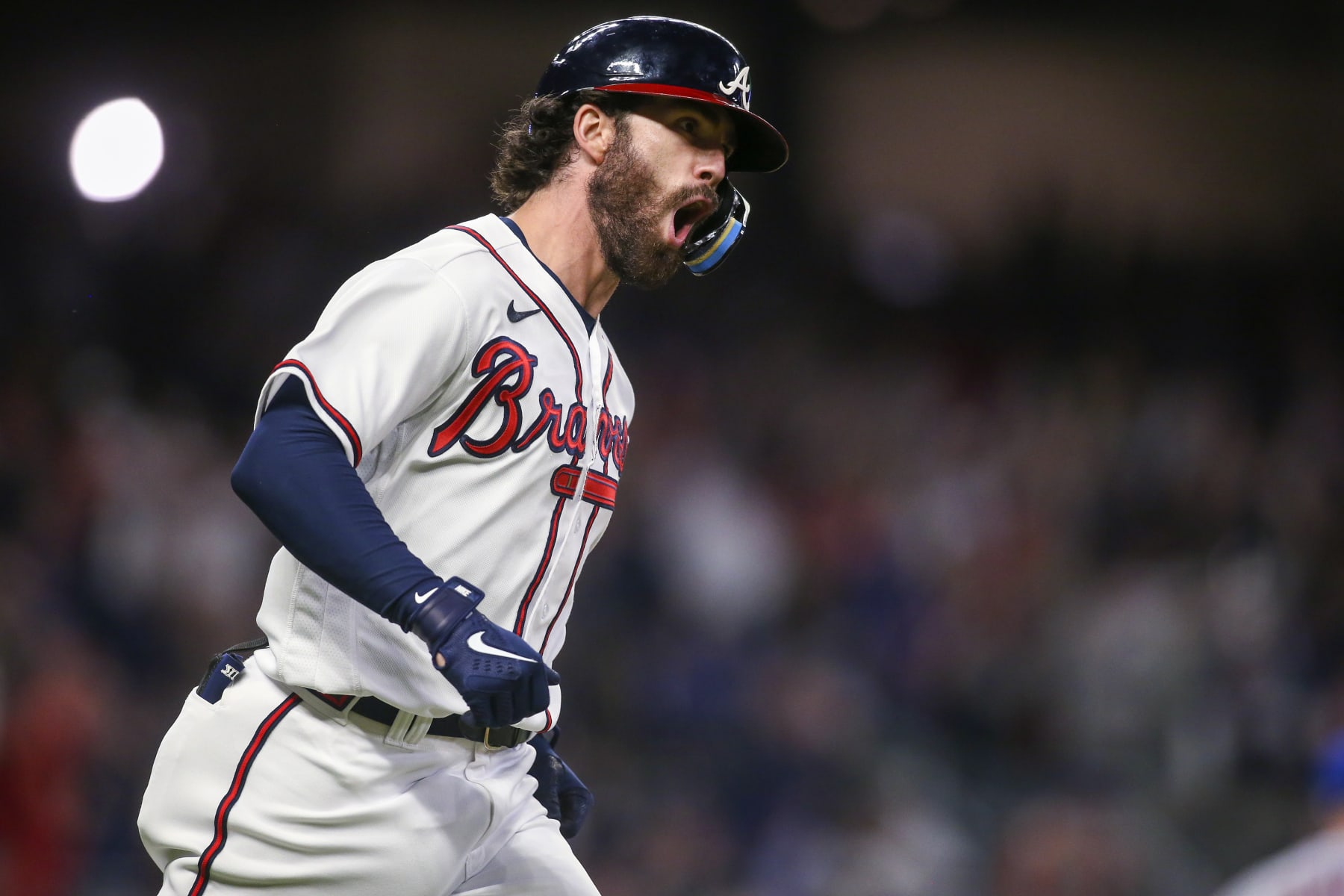 Atlanta Braves' Dansby Swanson runs the bases on a two-run home run against the New York Mets during the fifth inning of a baseball game Saturday, Oct. 1, 2022, in Atlanta. (AP Photo/Brett Davis)